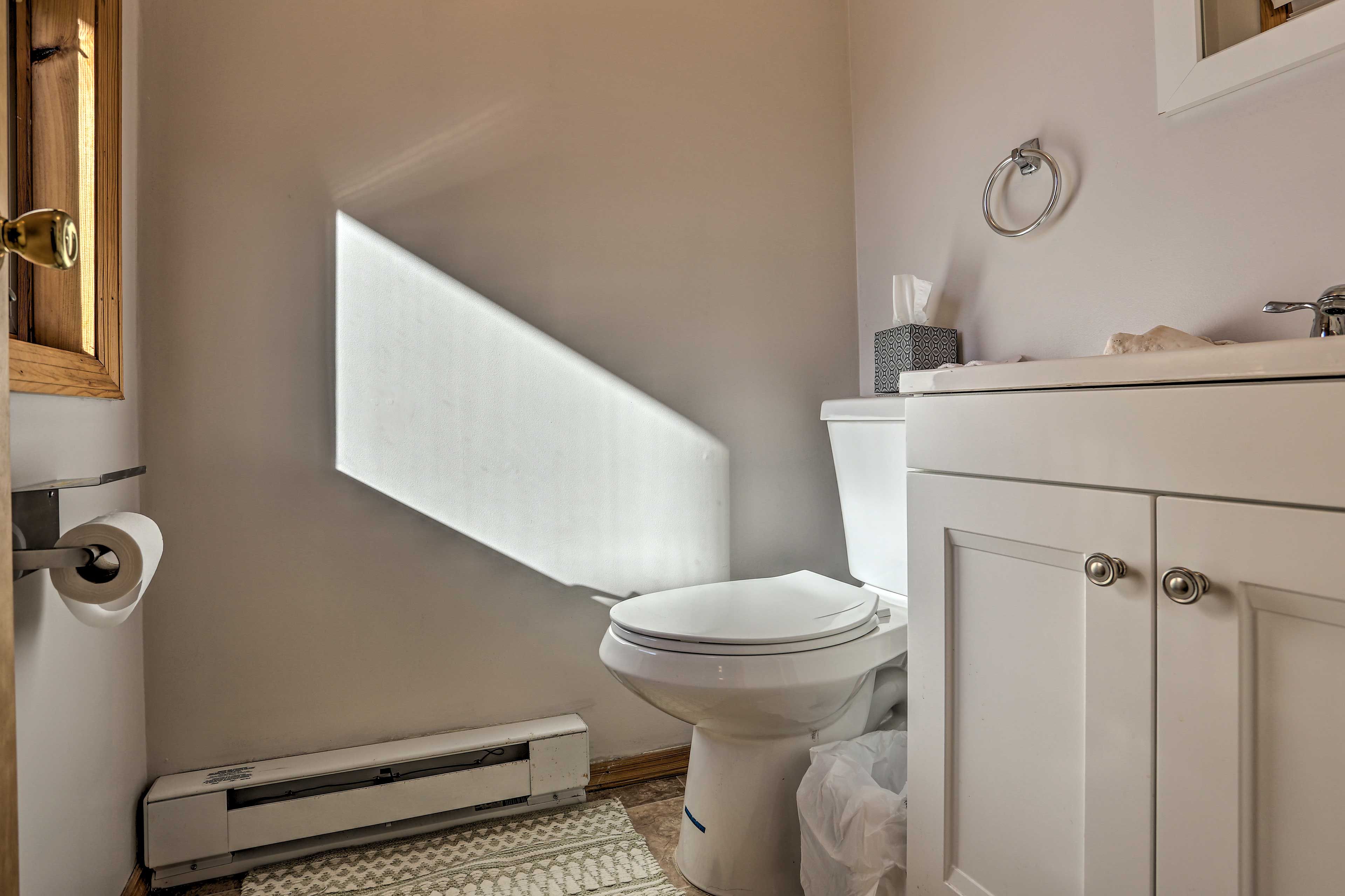 A half bath is also provided.
