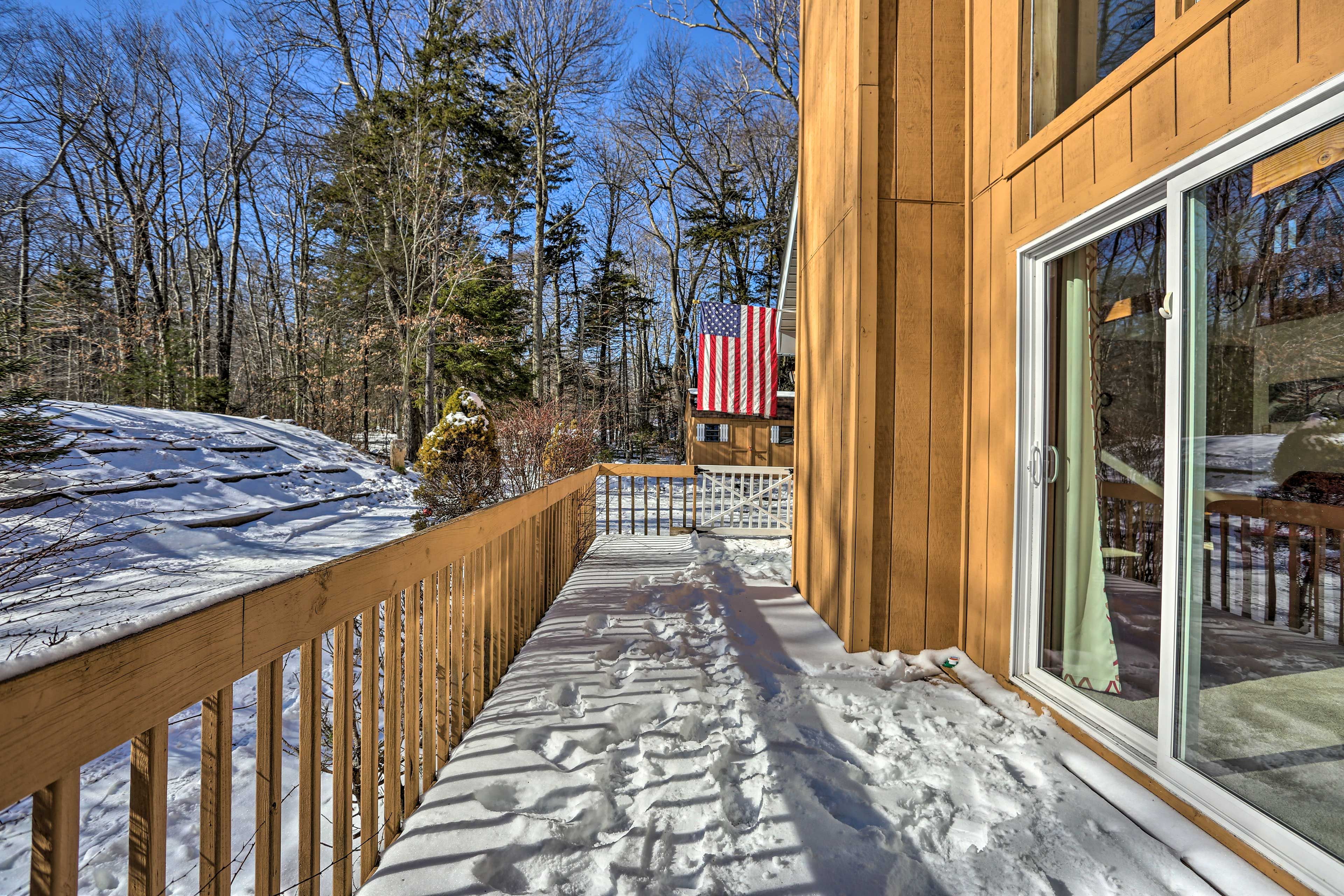 Step out to the wraparound deck for a breath of fresh air.