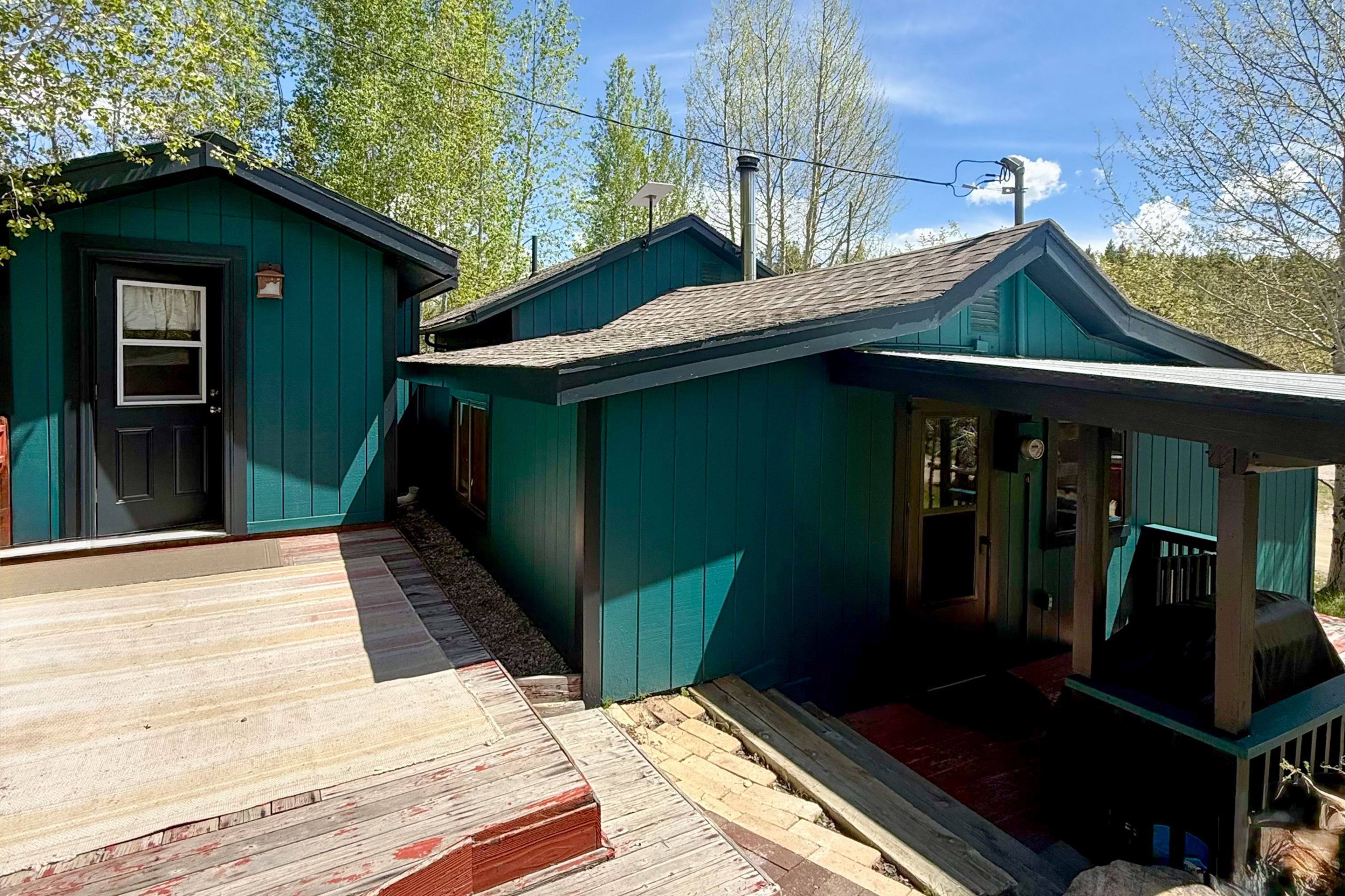 Property Exterior | Multi-Level Deck | Gas Grill | Dining Area
