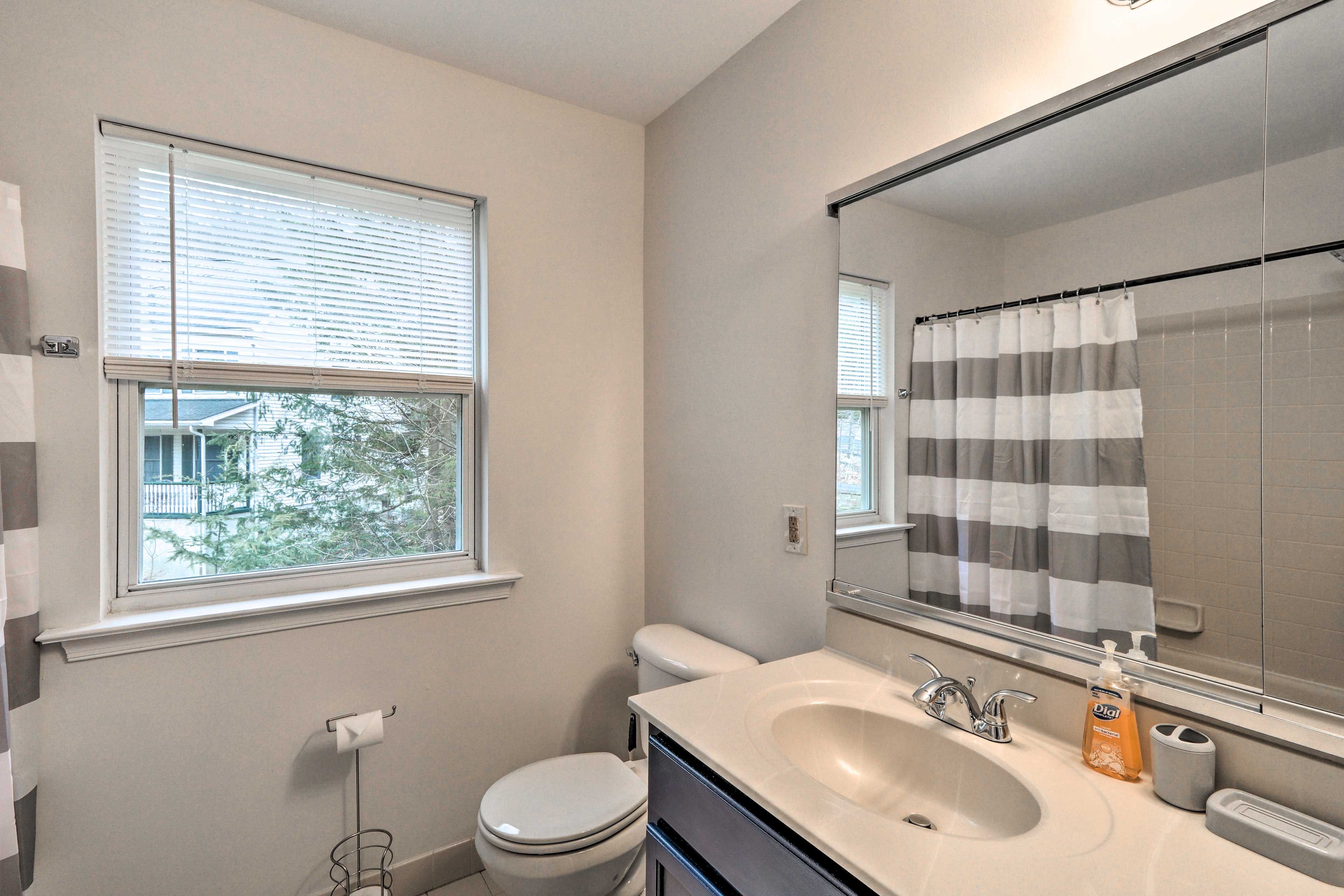 Rinse off in this full shower/tub combo.