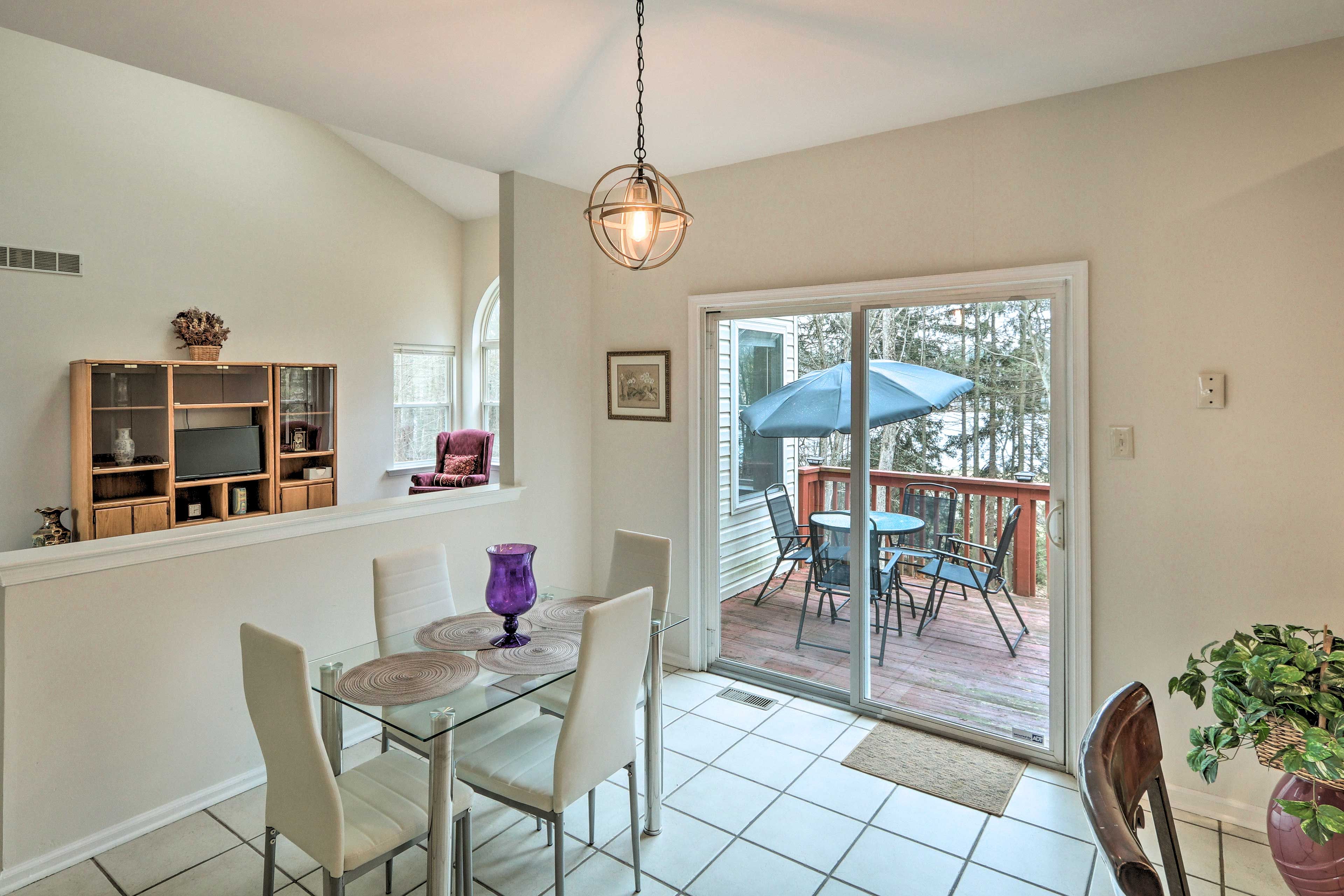 Seating is available at the eat-in kitchen table and breakfast bar.