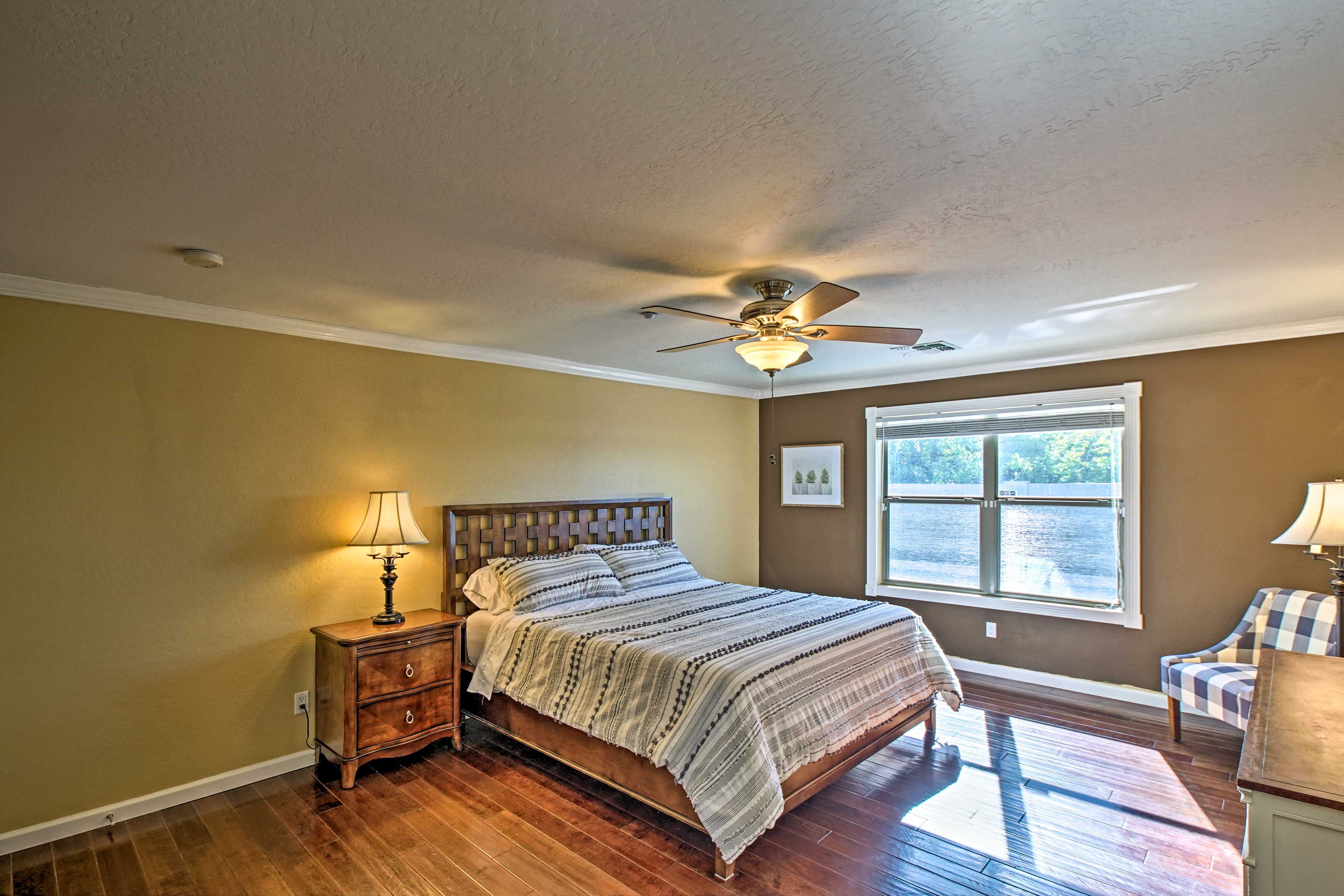 The first bedroom features a spacious California king bed.