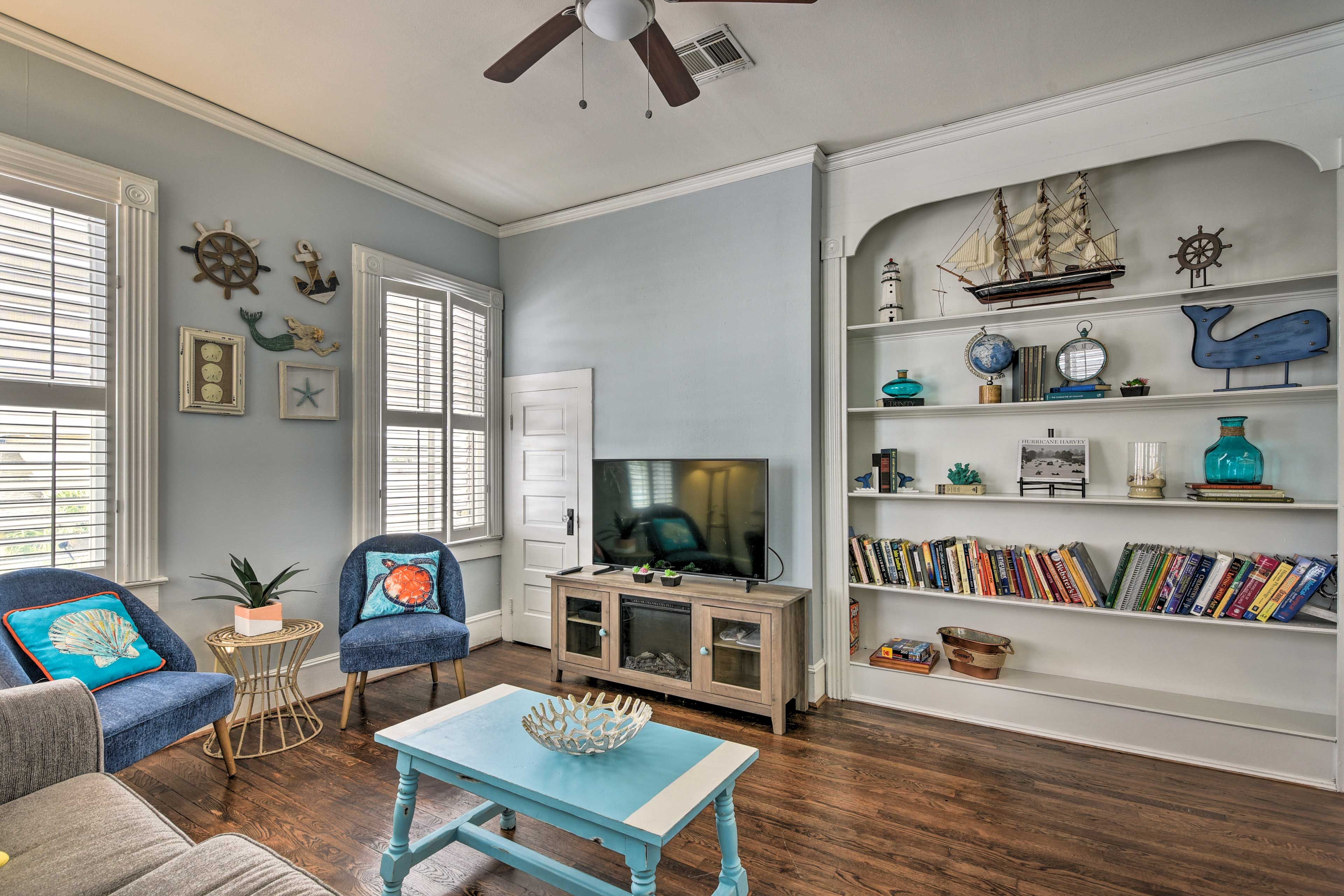 The ocean-inspired interior features built-in shelving and ocean details!