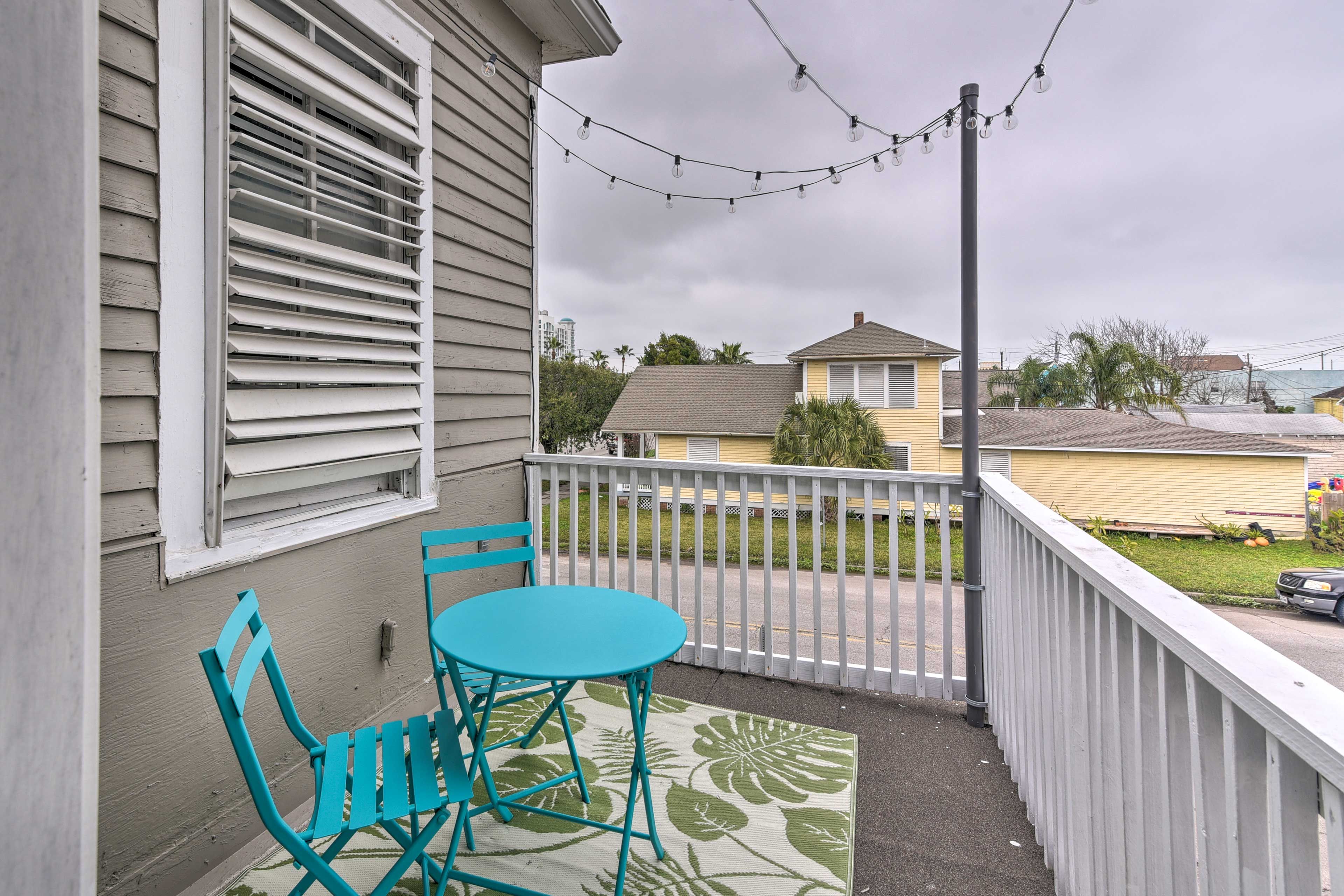 The 2-bedroom, 1-bathroom unit boasts a furnished private terrace.