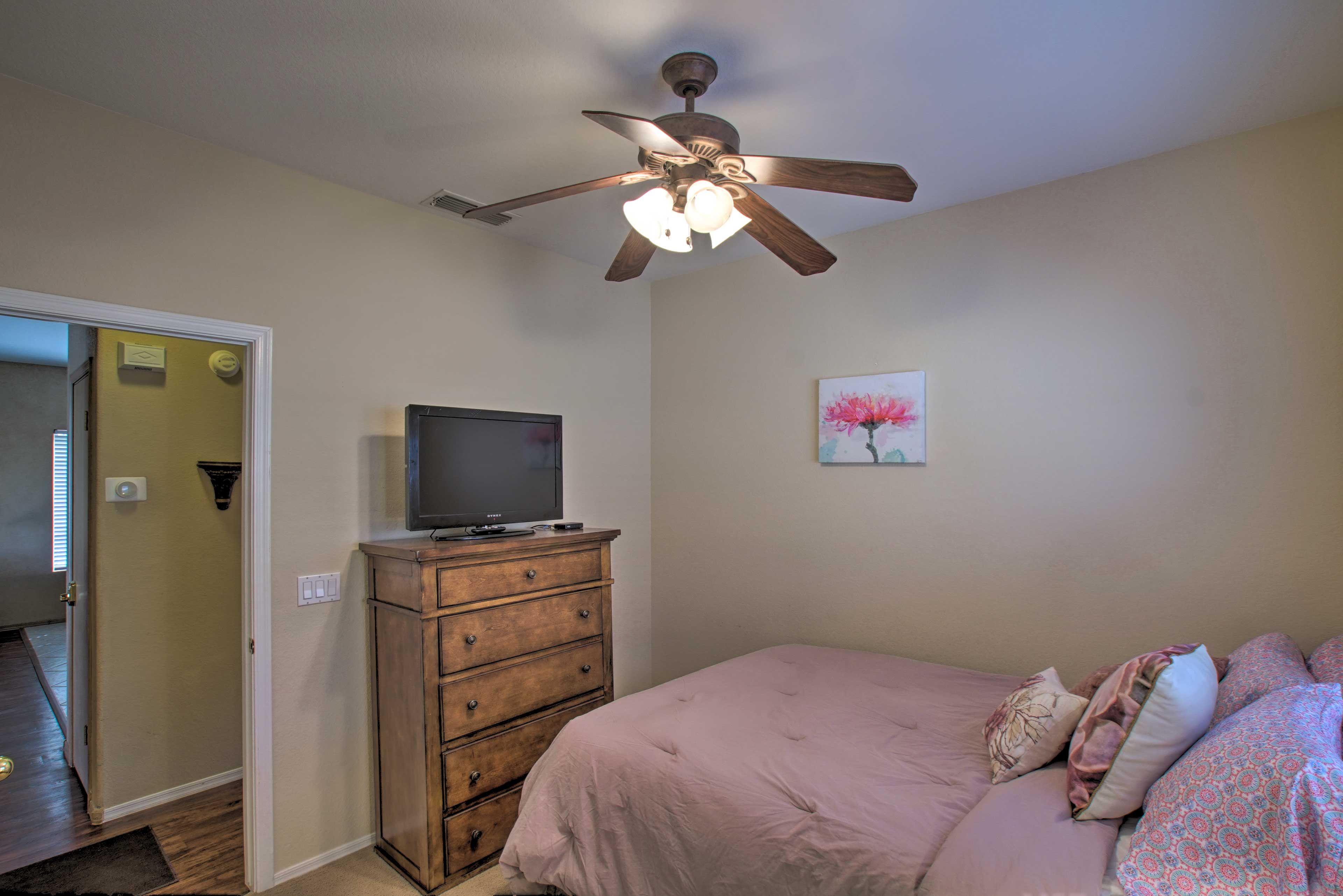 Decompress after the day's excitement with the bedside flat-screen Smart TV.