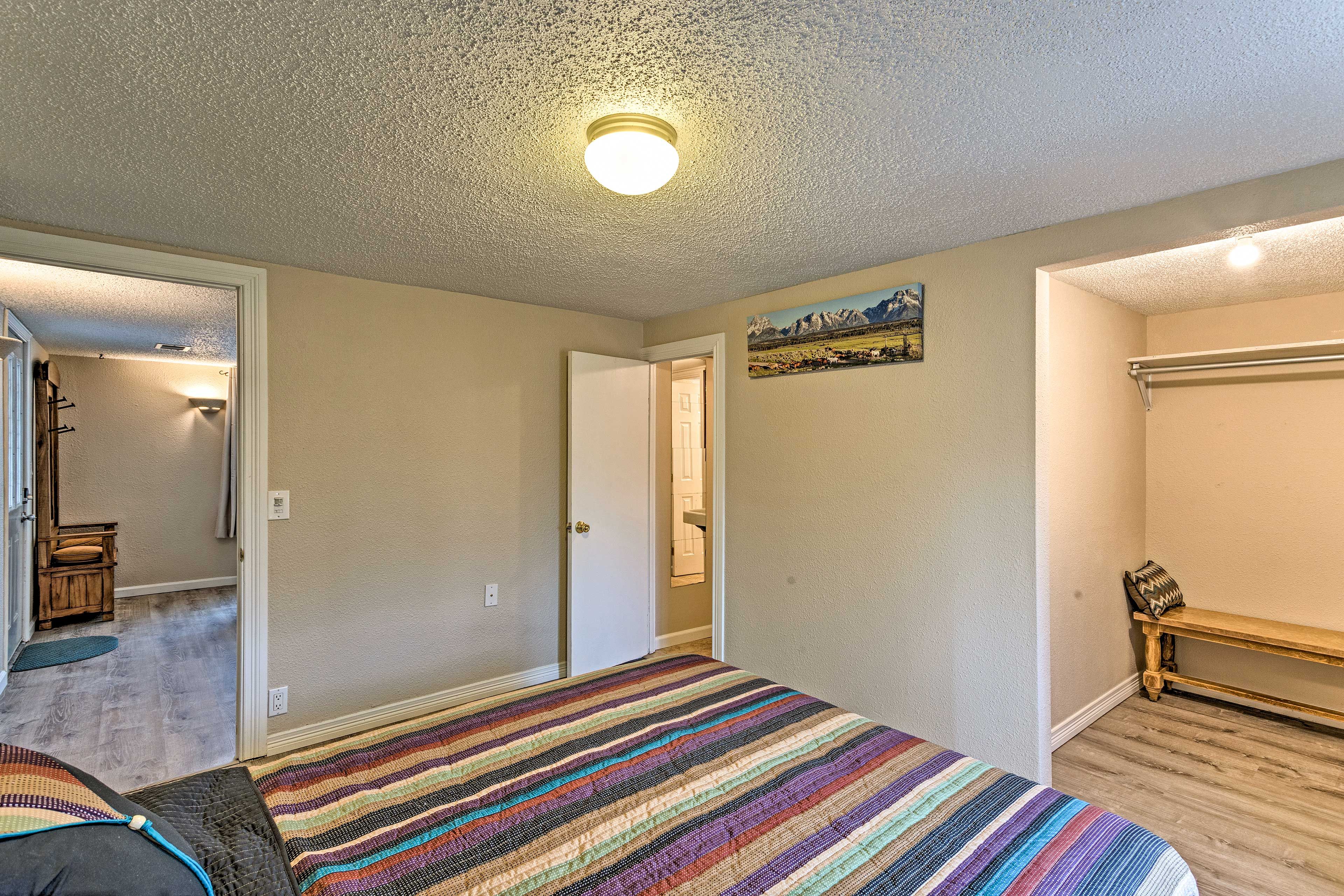 A spacious closet and en-suite bathroom complete the space.