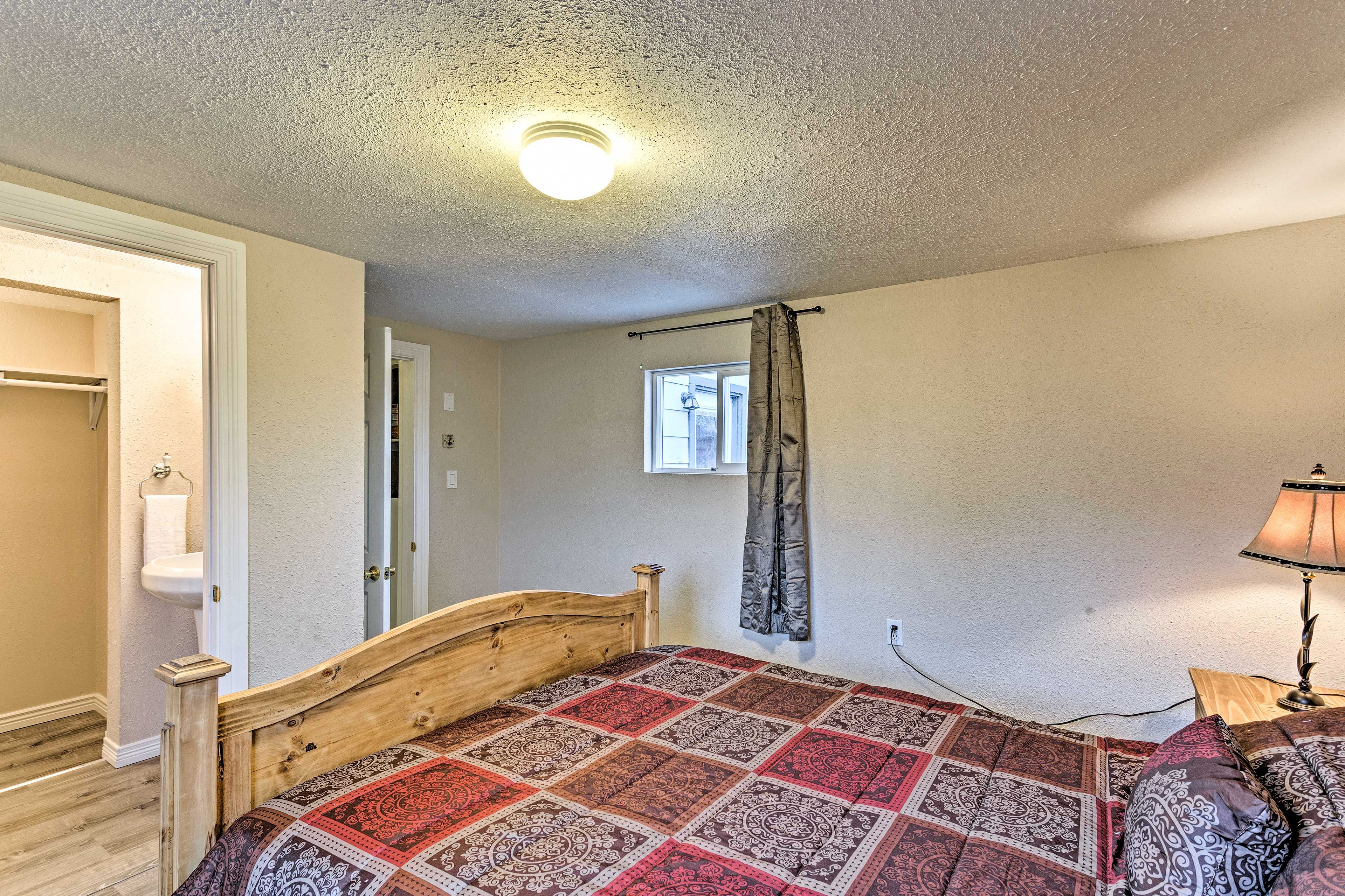 An en-suite bathroom completes the space.