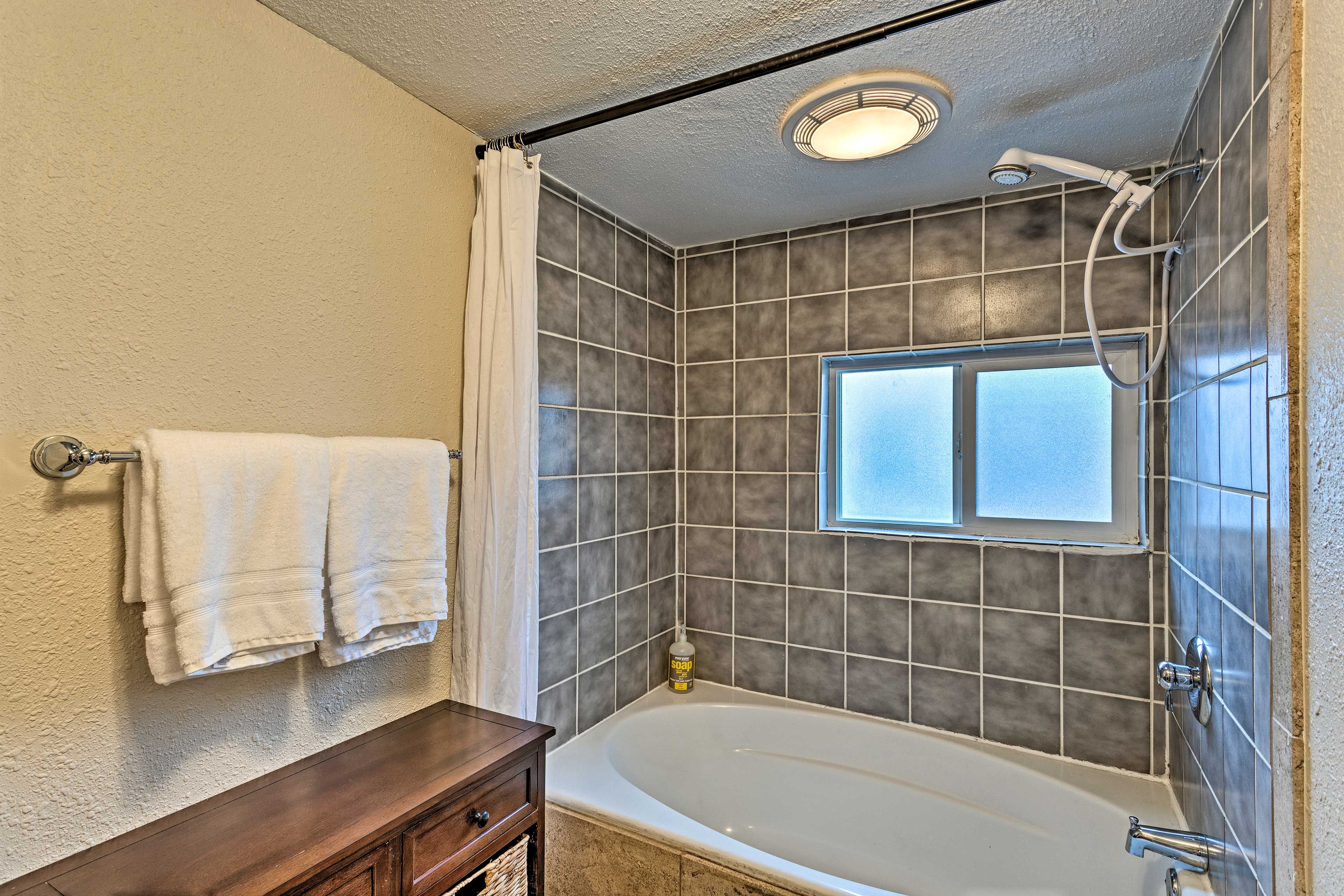 Rinse off in the shower/tub combo/=.