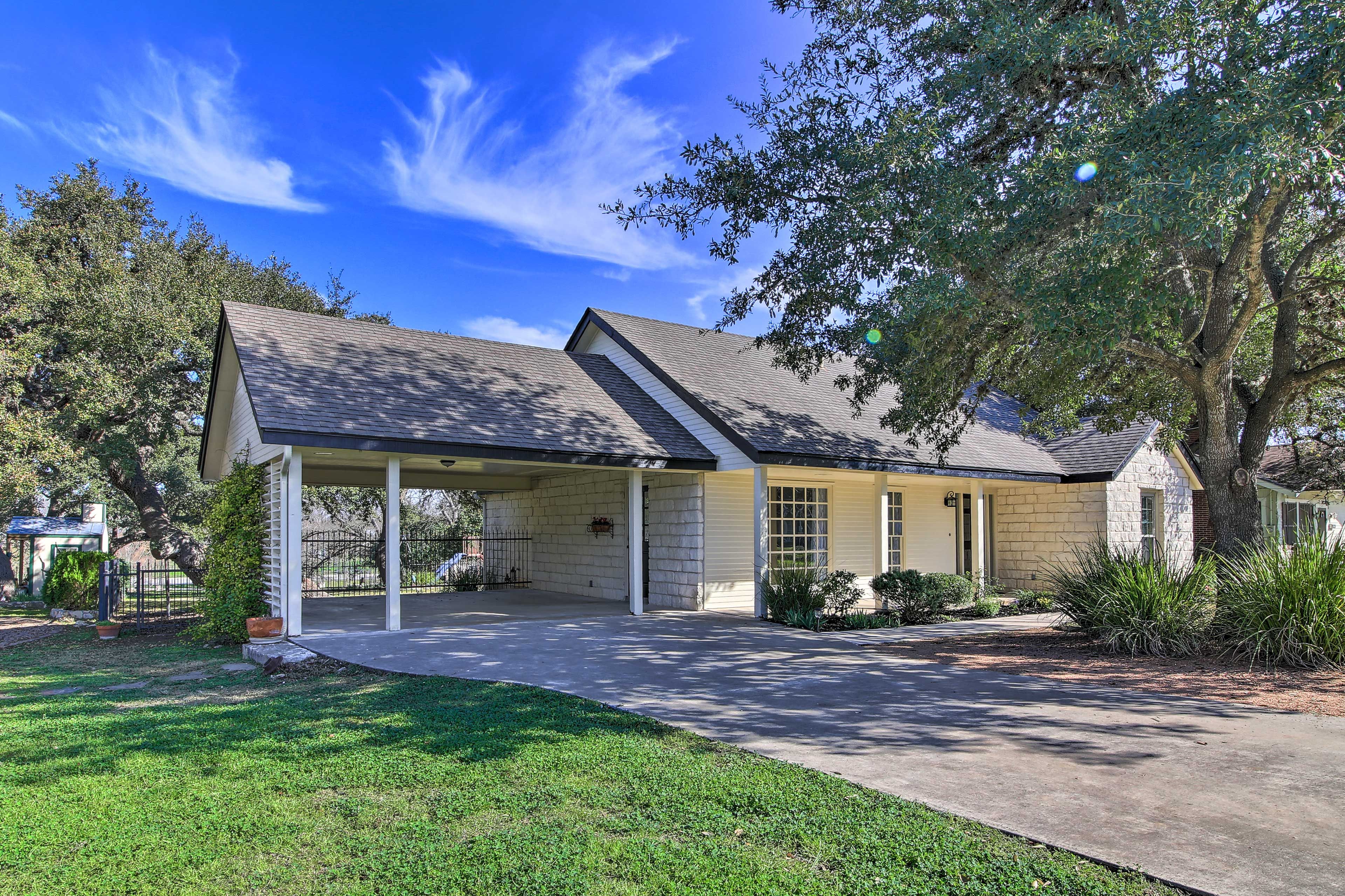 Easily park up to a few vehicles in the carport and driveway.