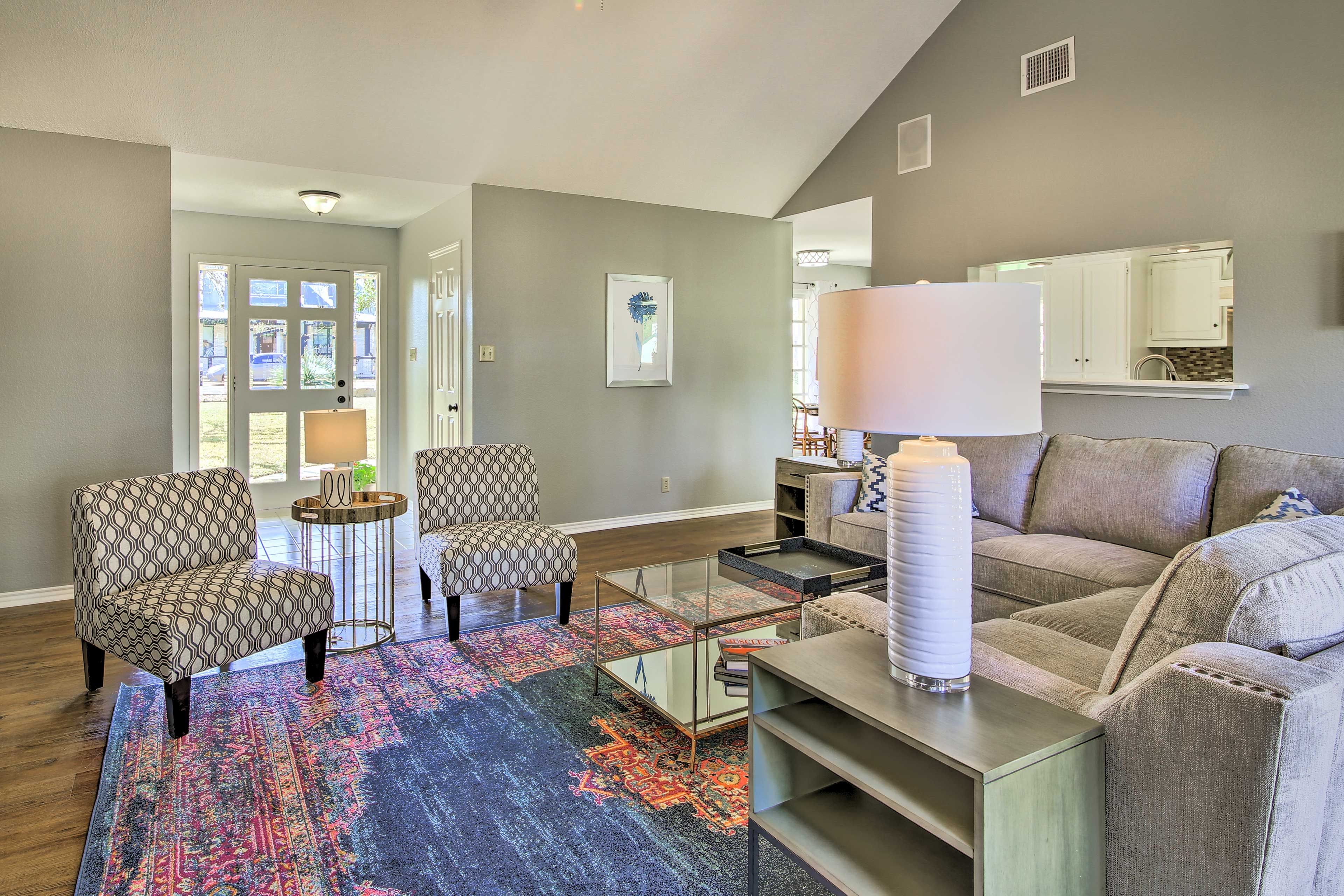 The vacation rental features updated walls, floors, and furnishings.