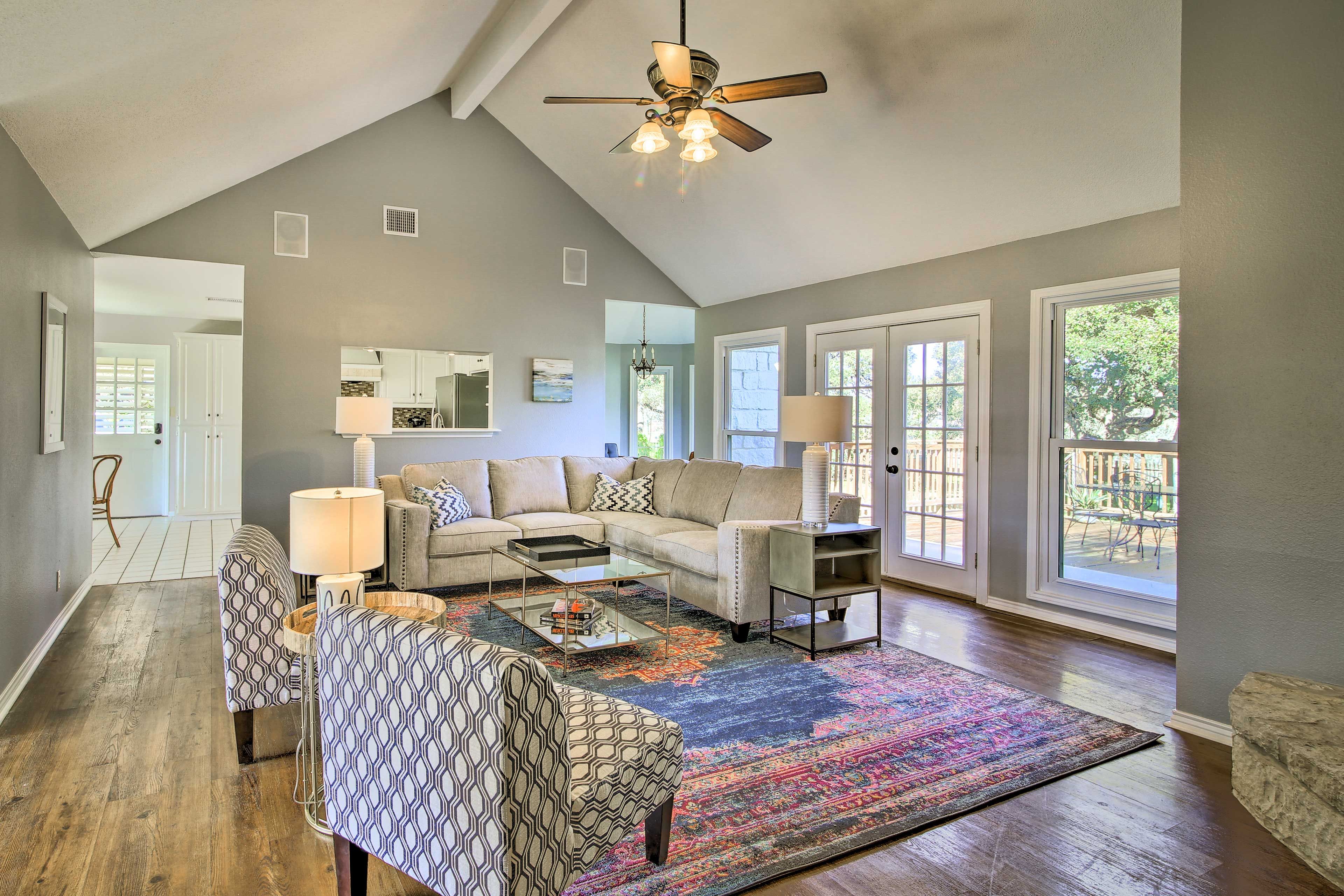 Vaulted ceilings and numerous windows create a light and airy atmosphere.