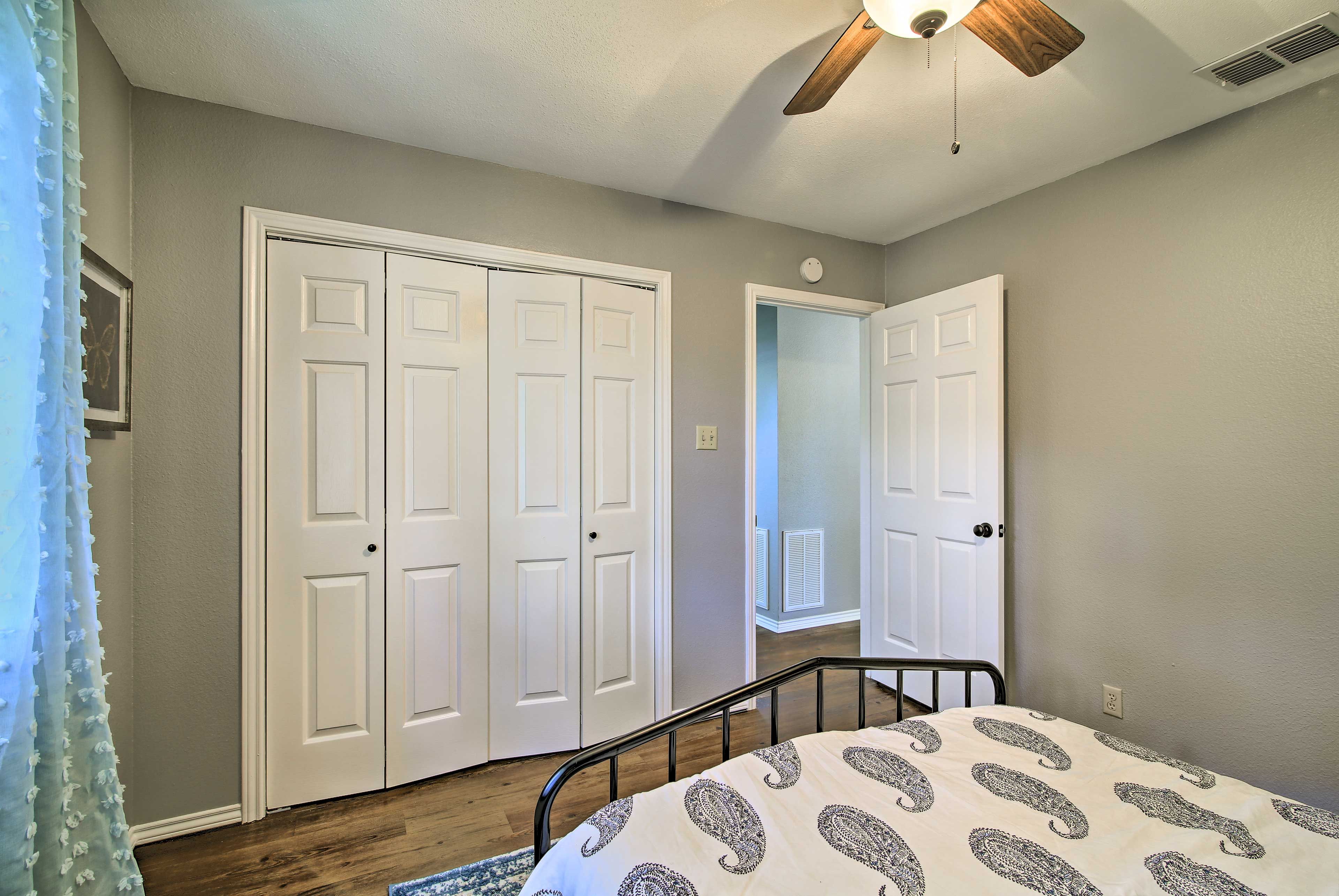 A full bed, ceiling fan, and closet set this room apart.