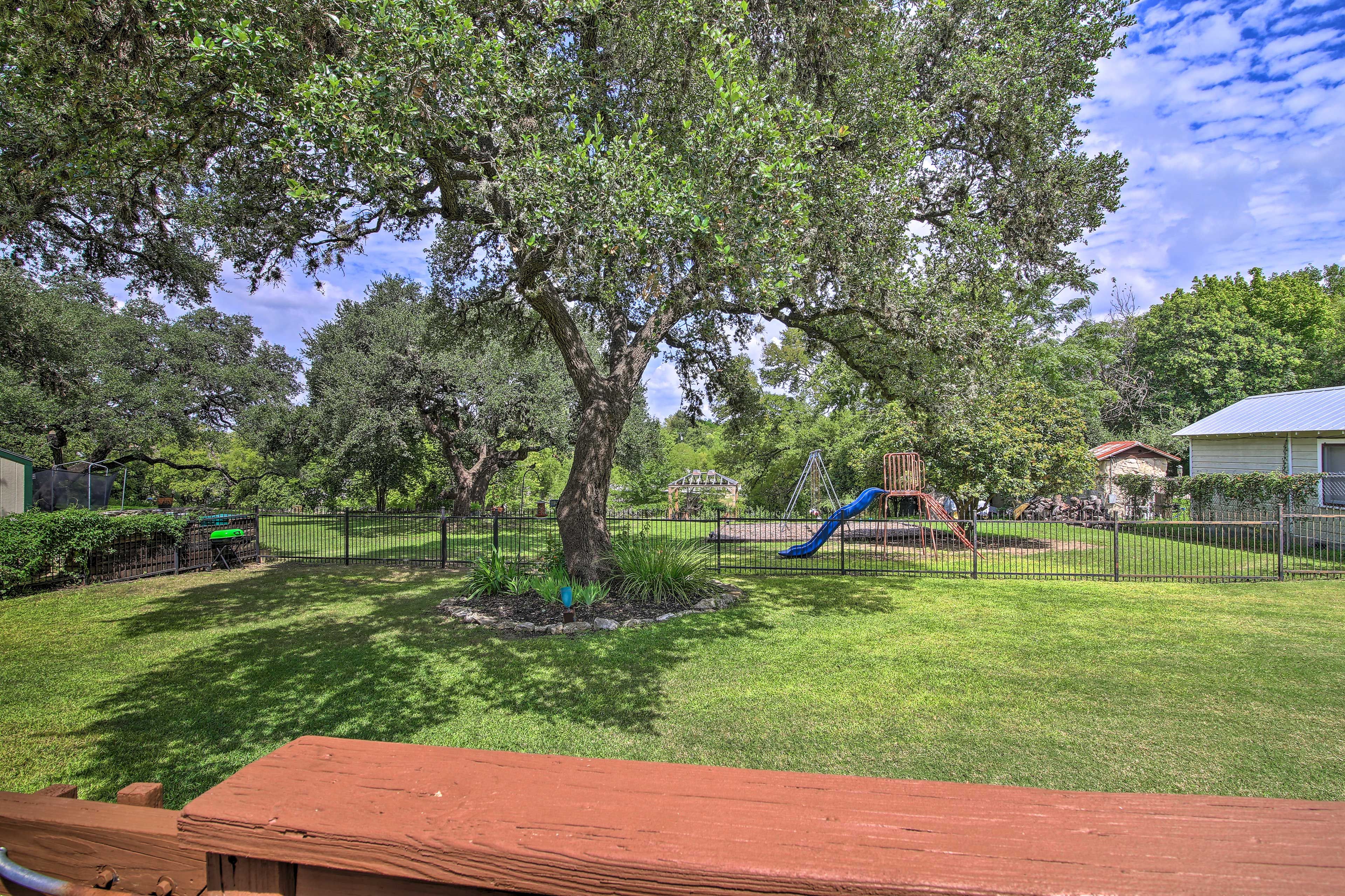 Kids will quickly spot the playground located on the other side of the gate!