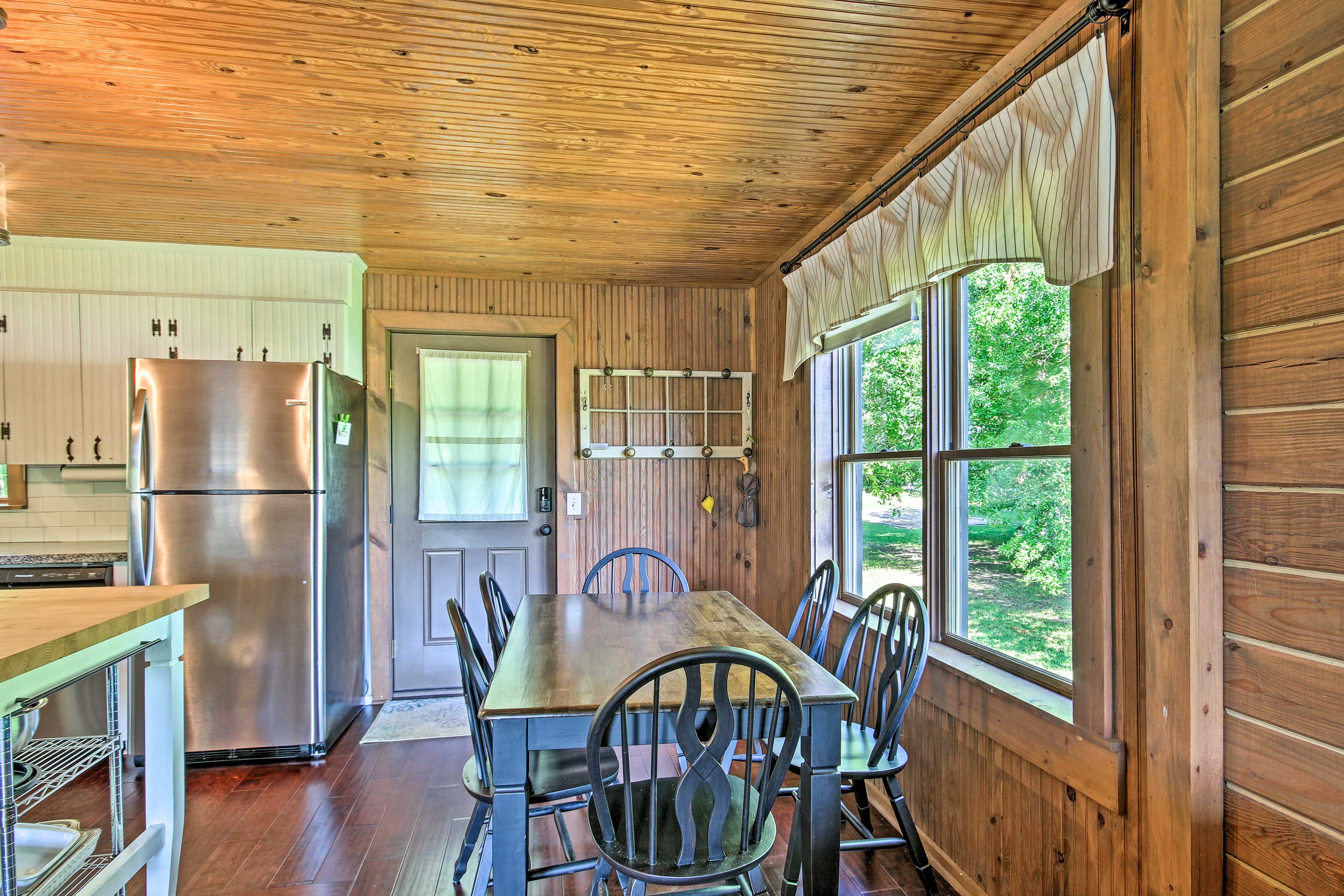 Rise and shine with a cup of coffee at the dining table.