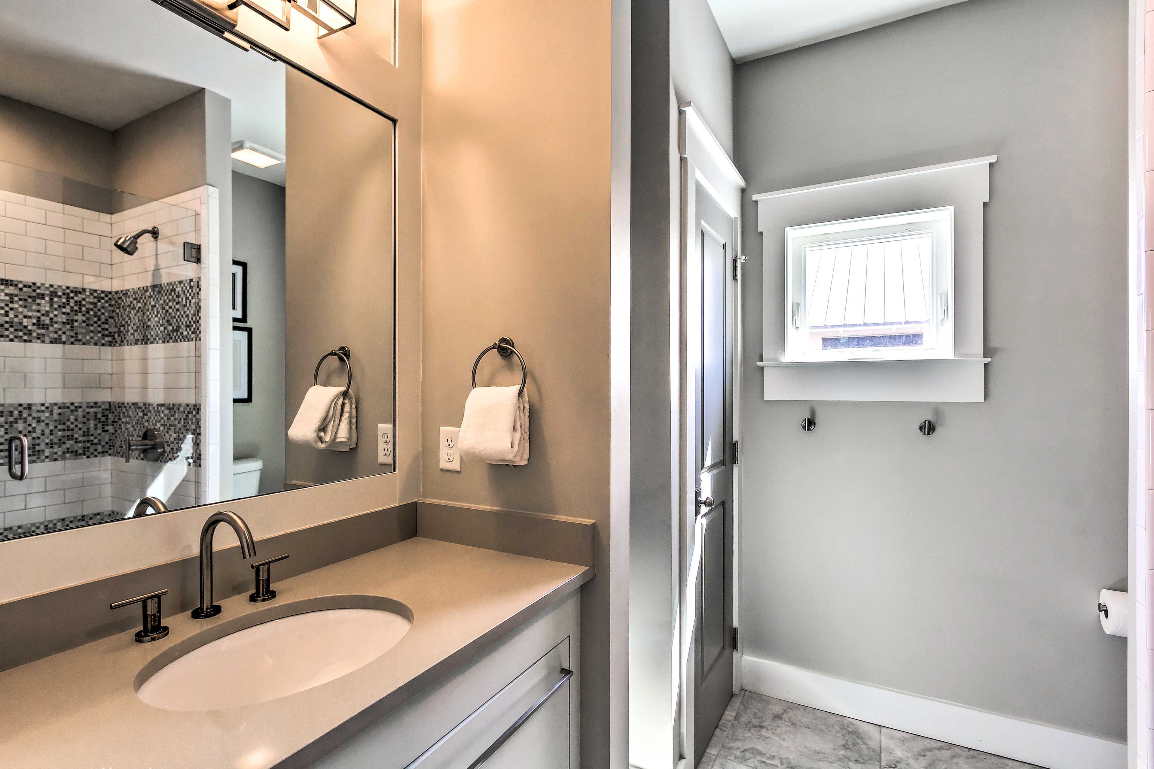 The home provides 5 full bathrooms & 1 half bath.