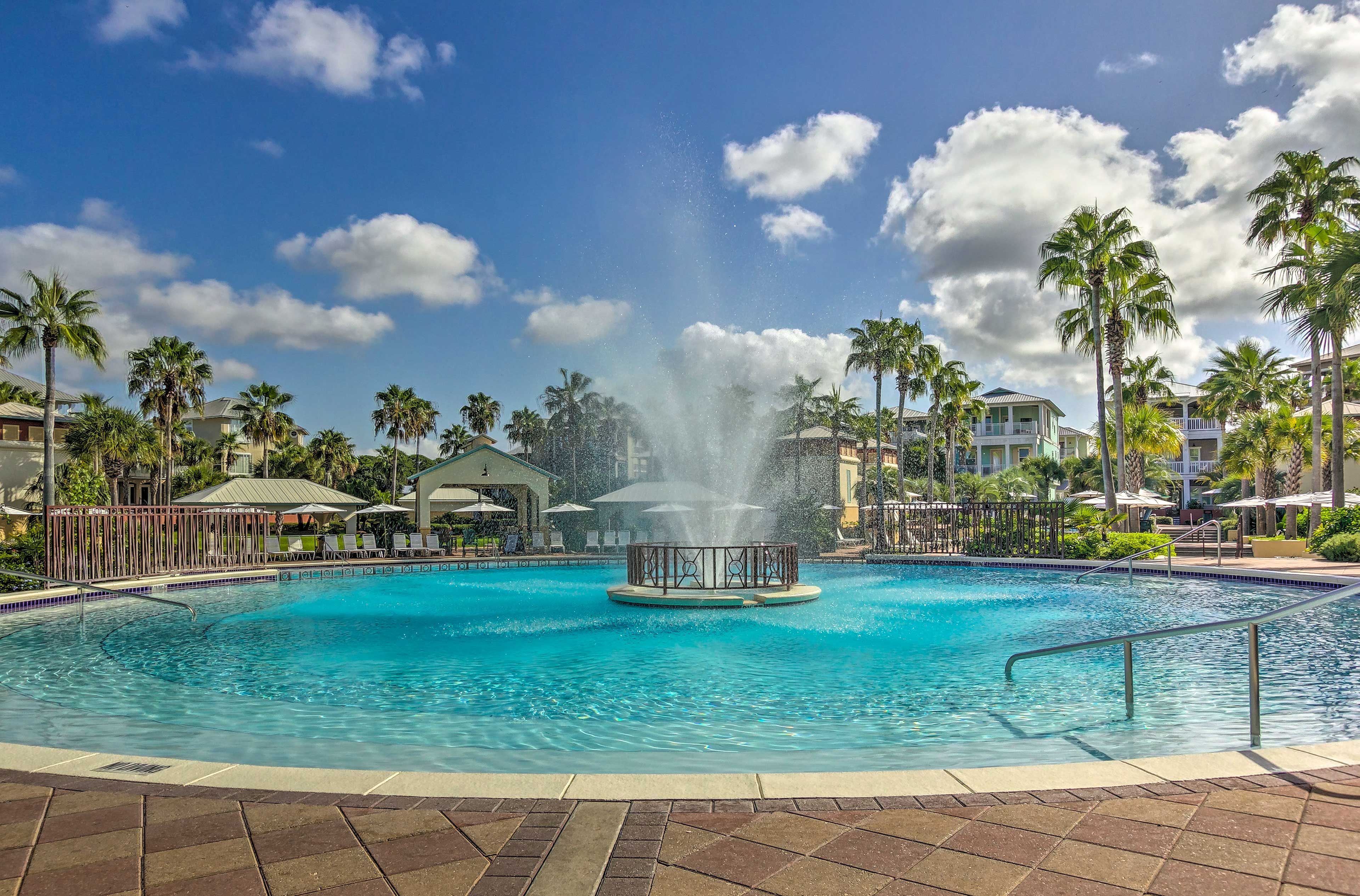 Mingle with other travelers by the pool.