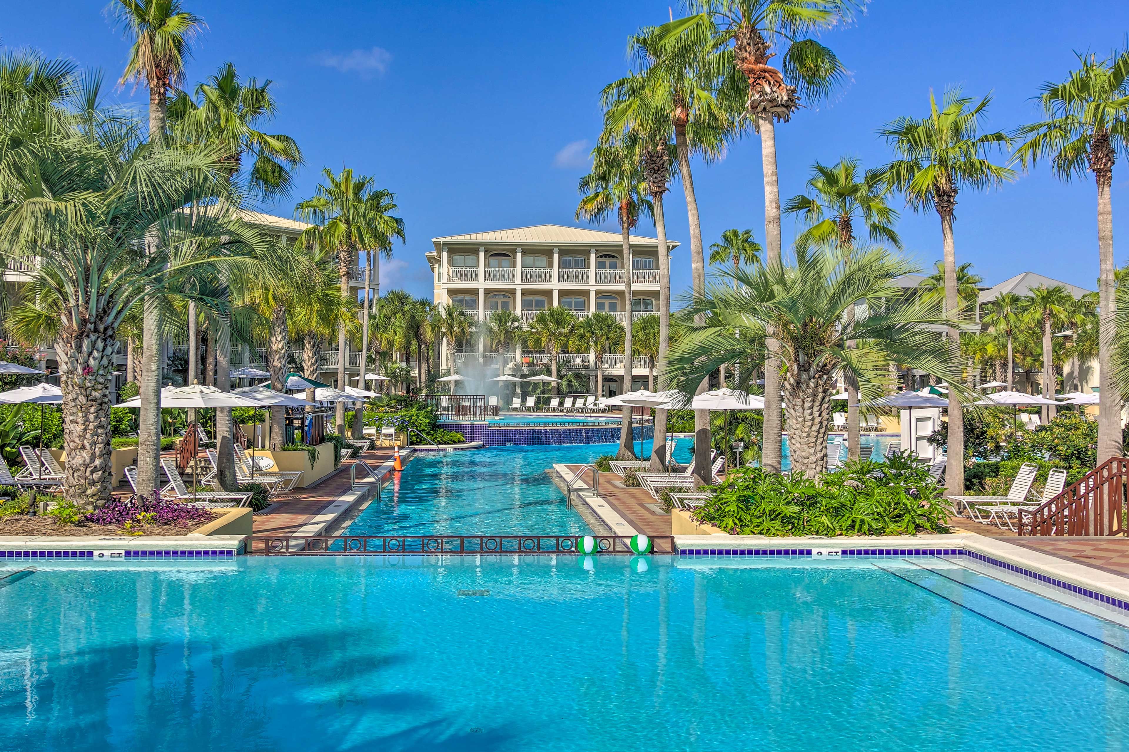 This expansive pool area features multiple lounge areas.