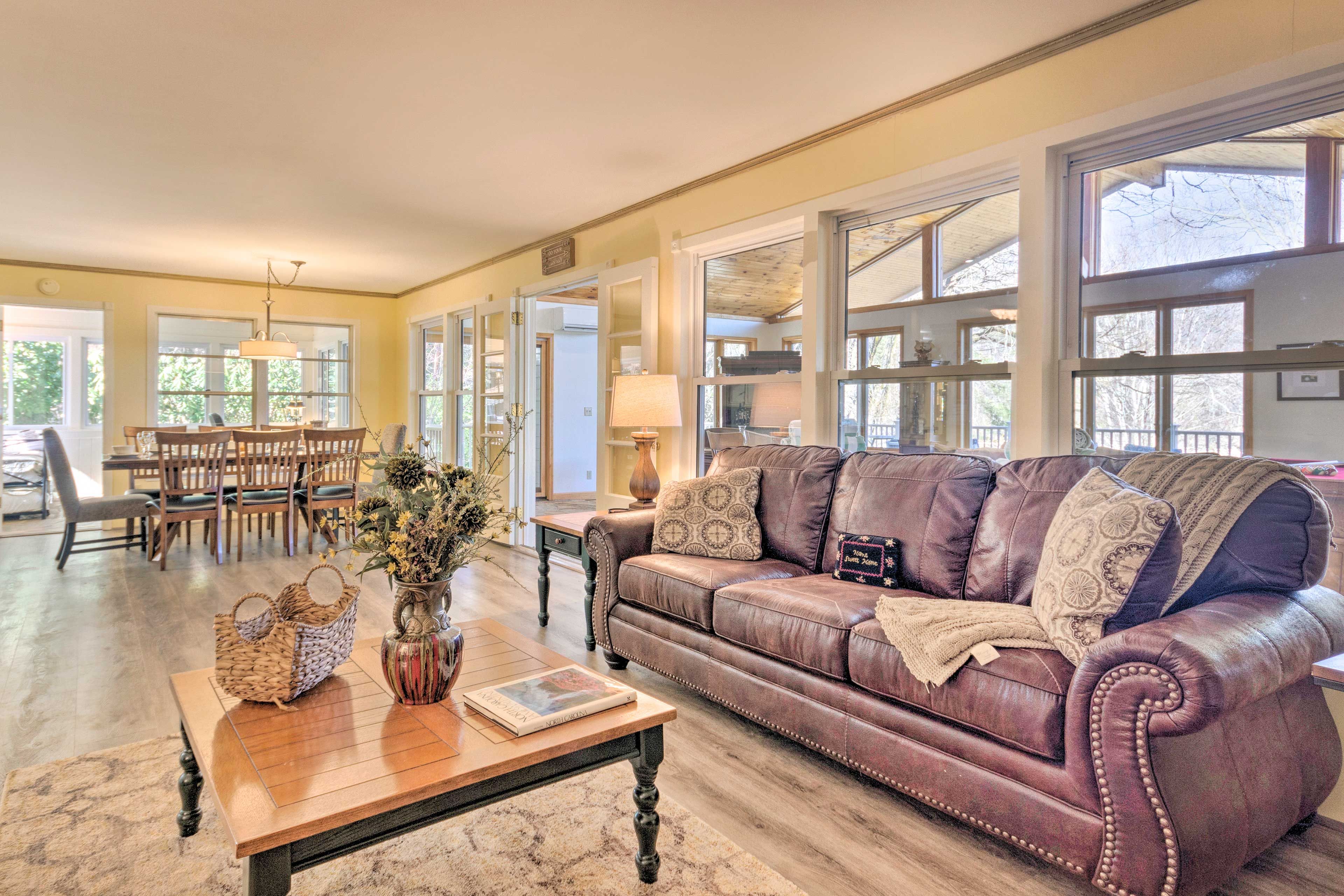 The many windows allow natural light throughout the whole space.