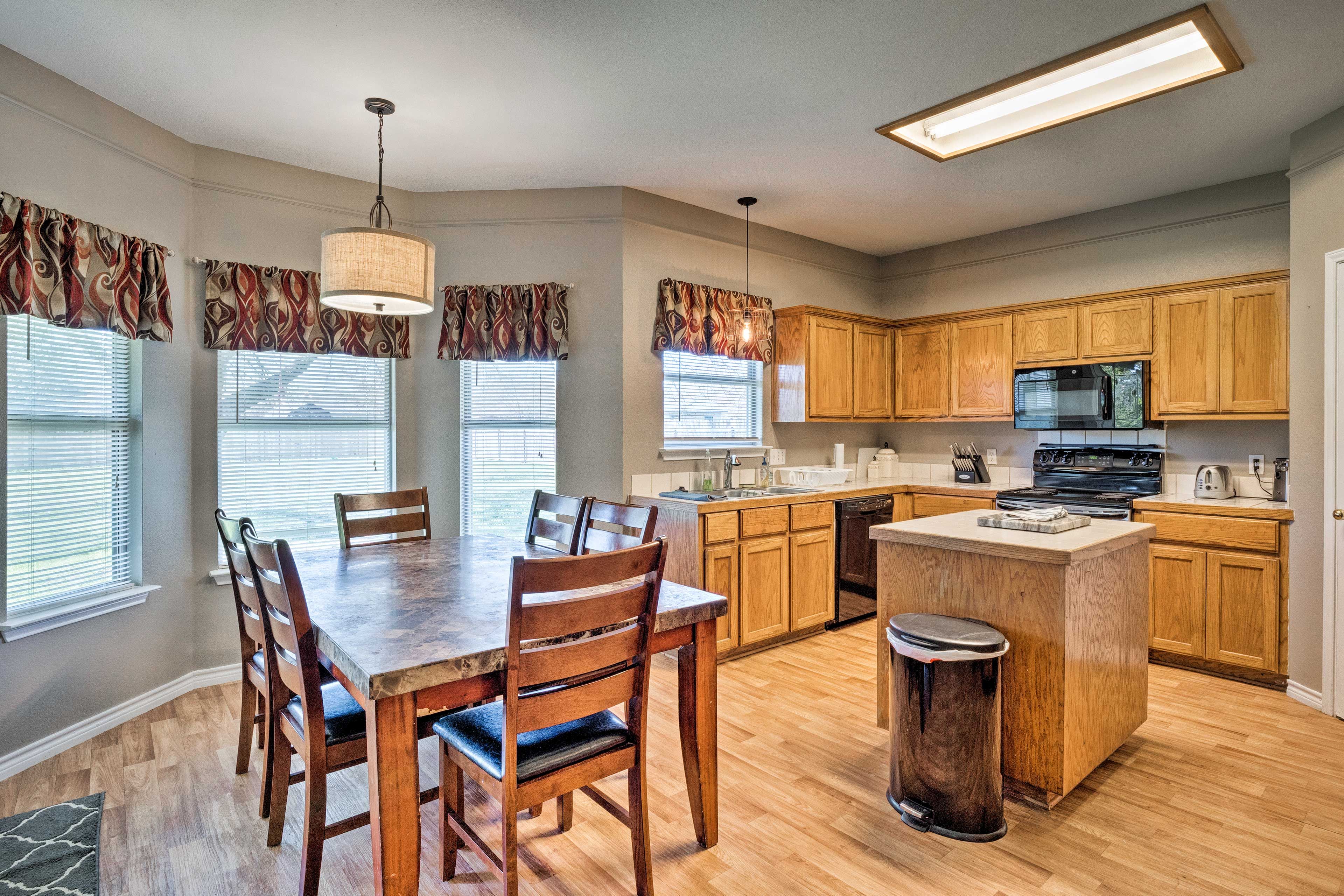 The fully equipped kitchen will have you feeling right at home.