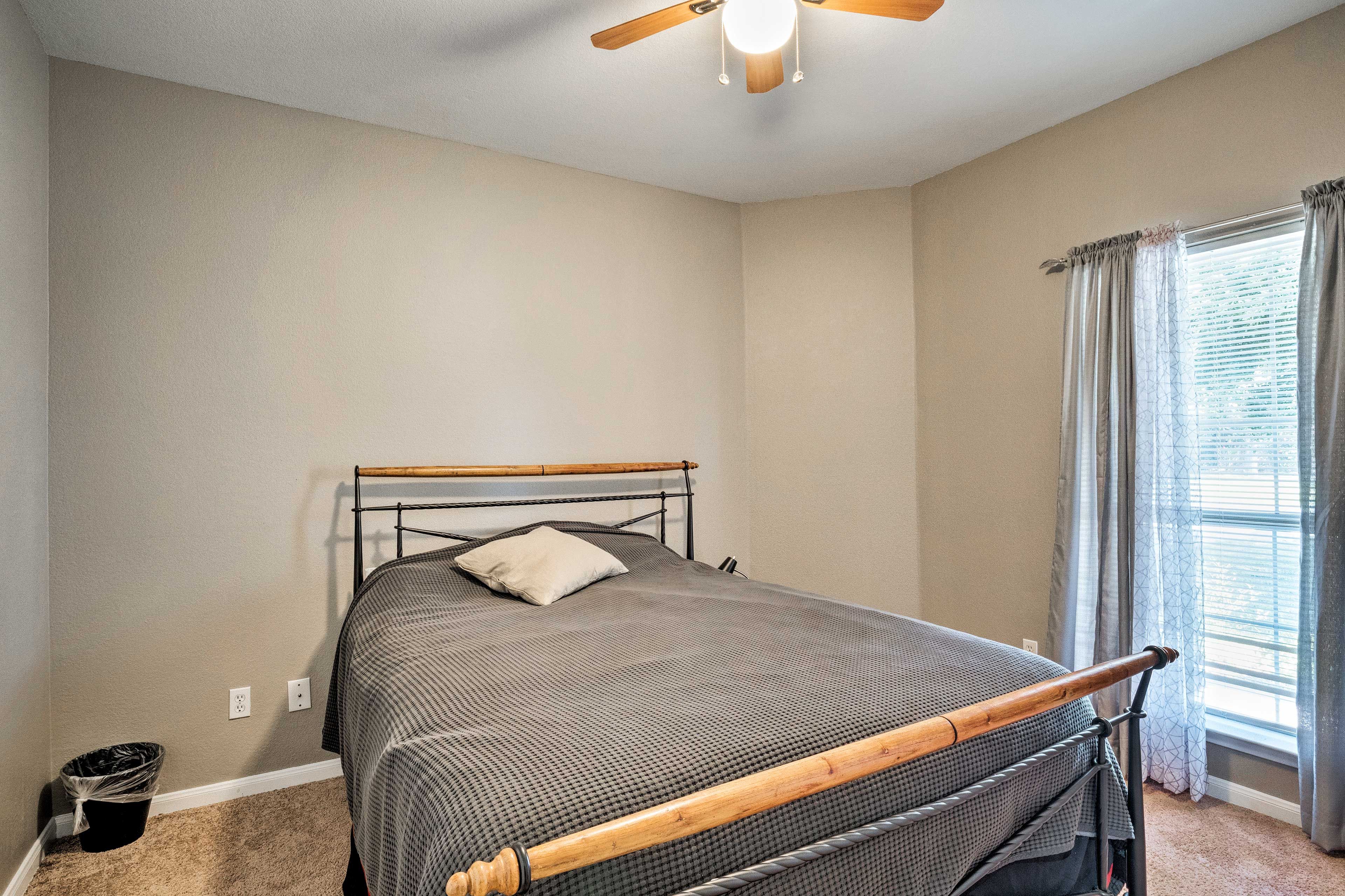 Dream peacefully in this queen bed.