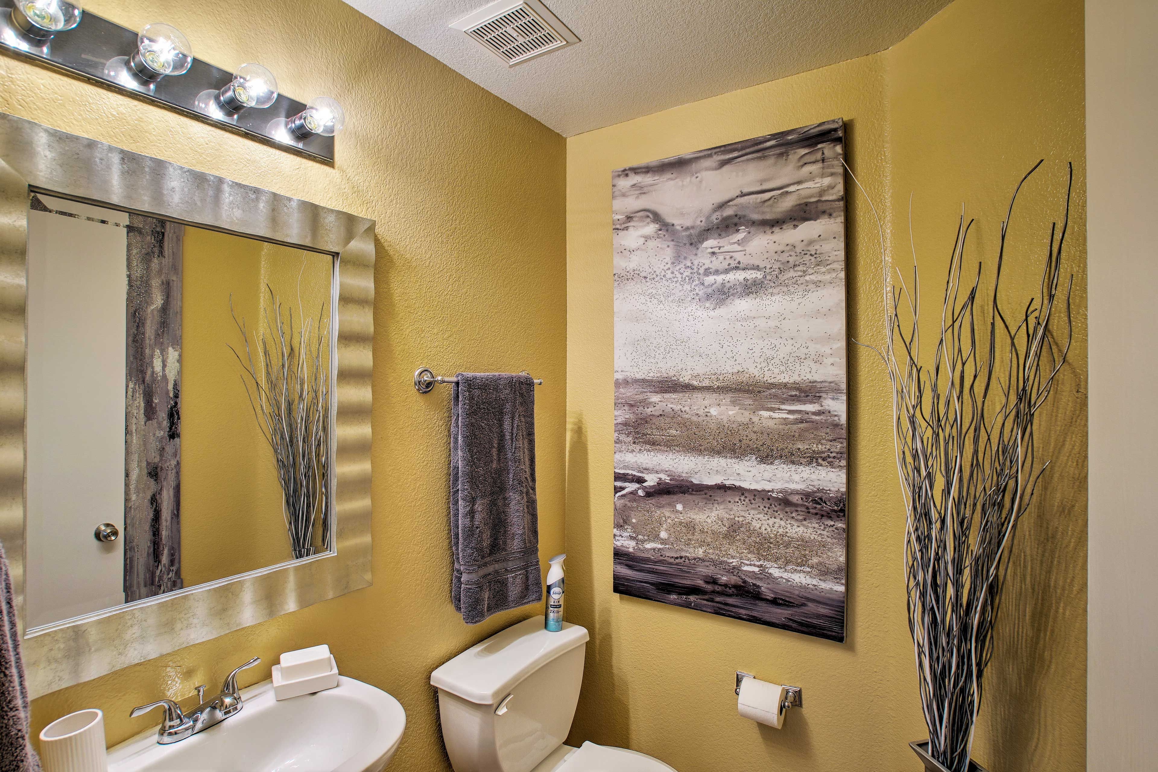 There is an additional half bath in the main living space.