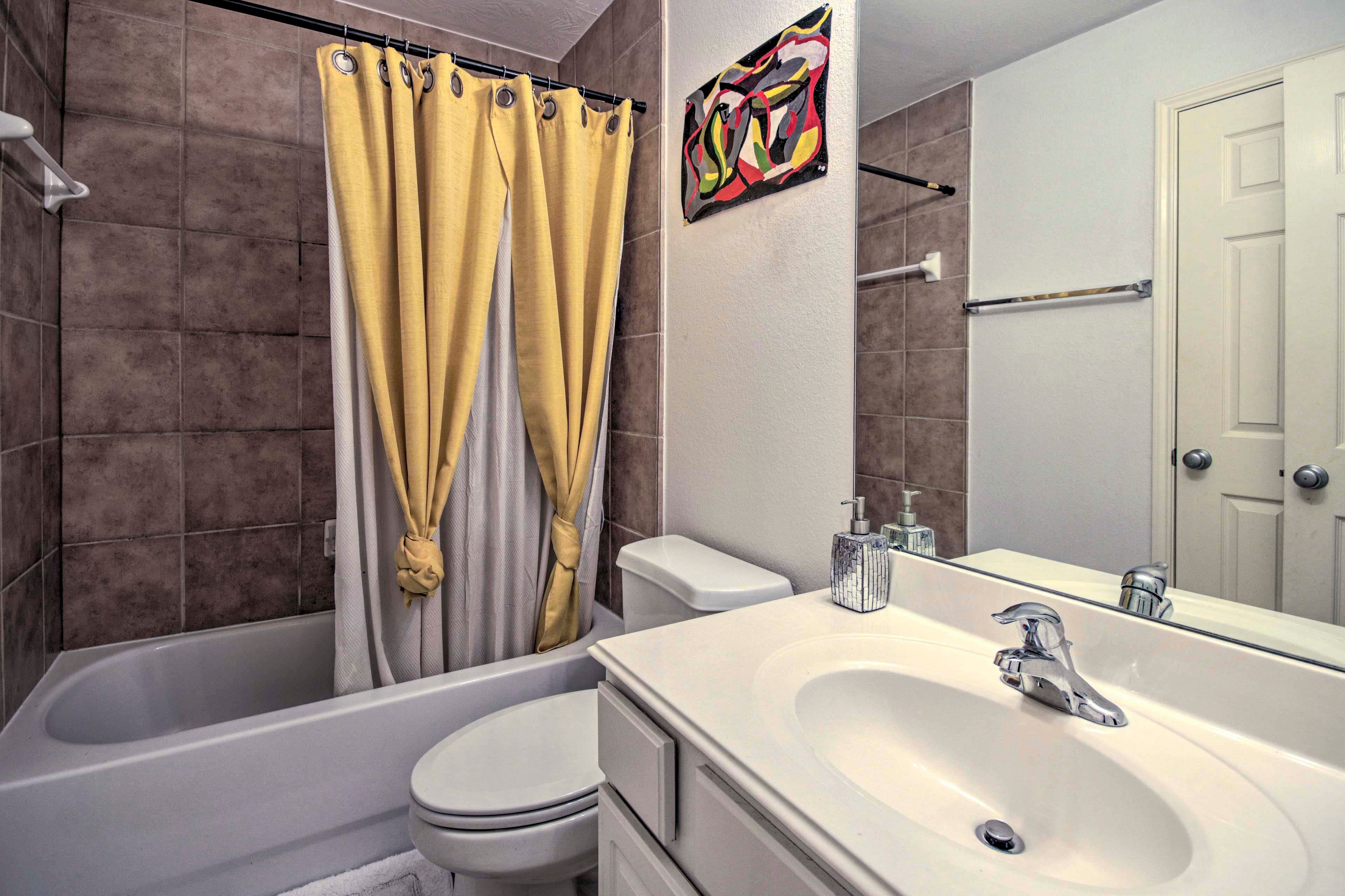 The second full bathroom features a shower/tub combo.
