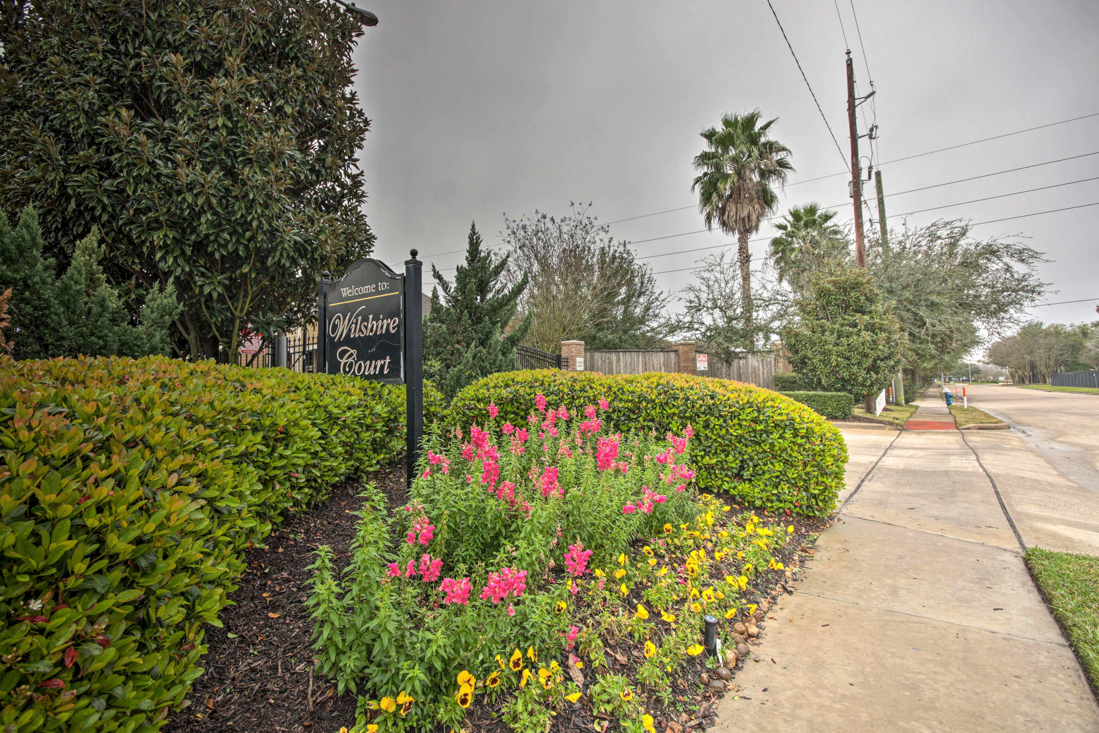 You'll notice the 'Wilshire Court' sign outside the community entrance!