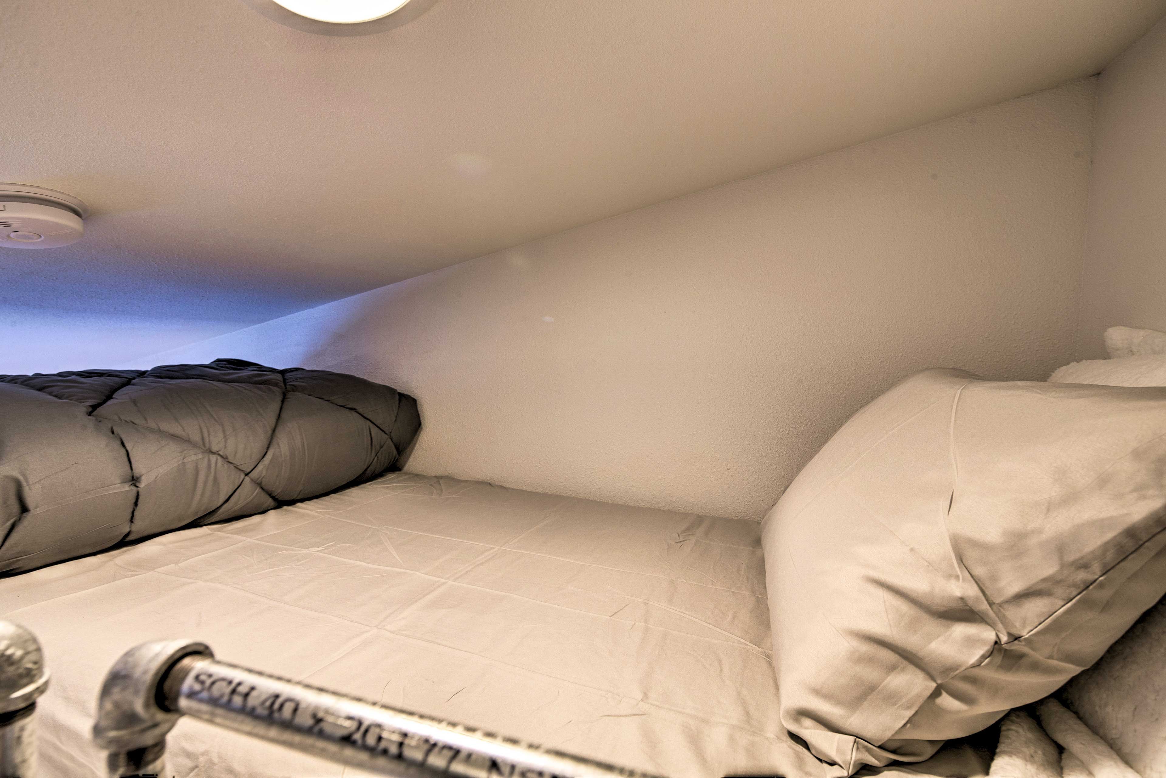 Two guests can sleep up in this full-sized bed.