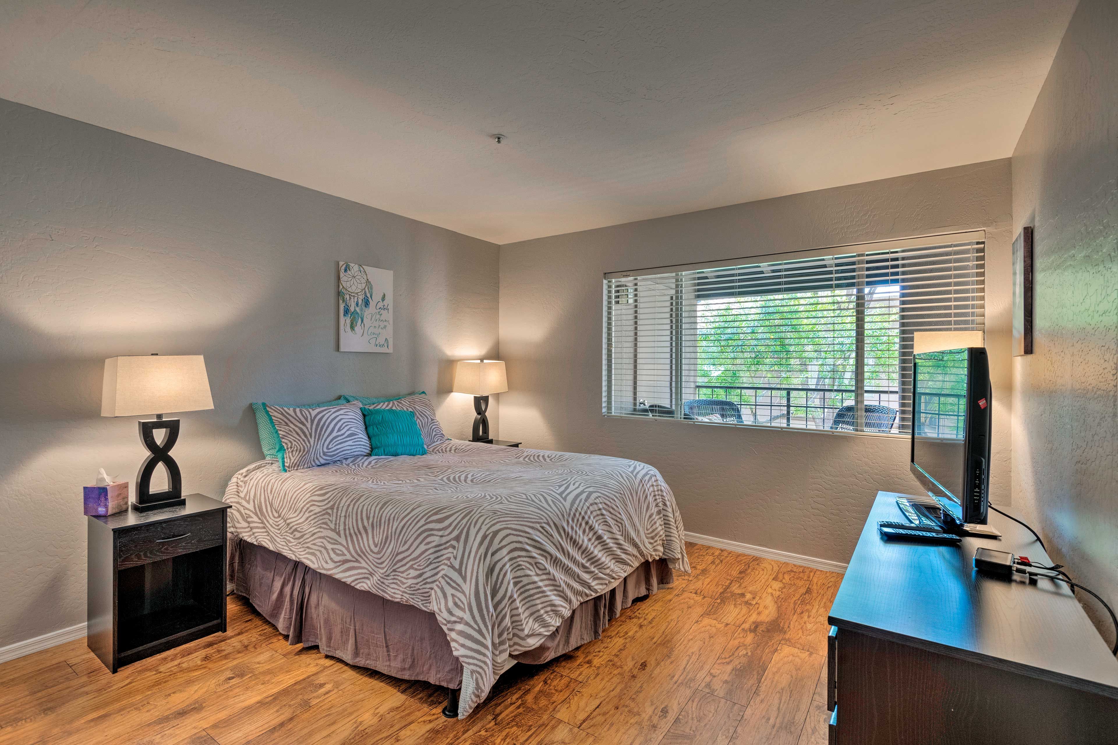 Sleep will come easy in this bright and breezy bedroom.