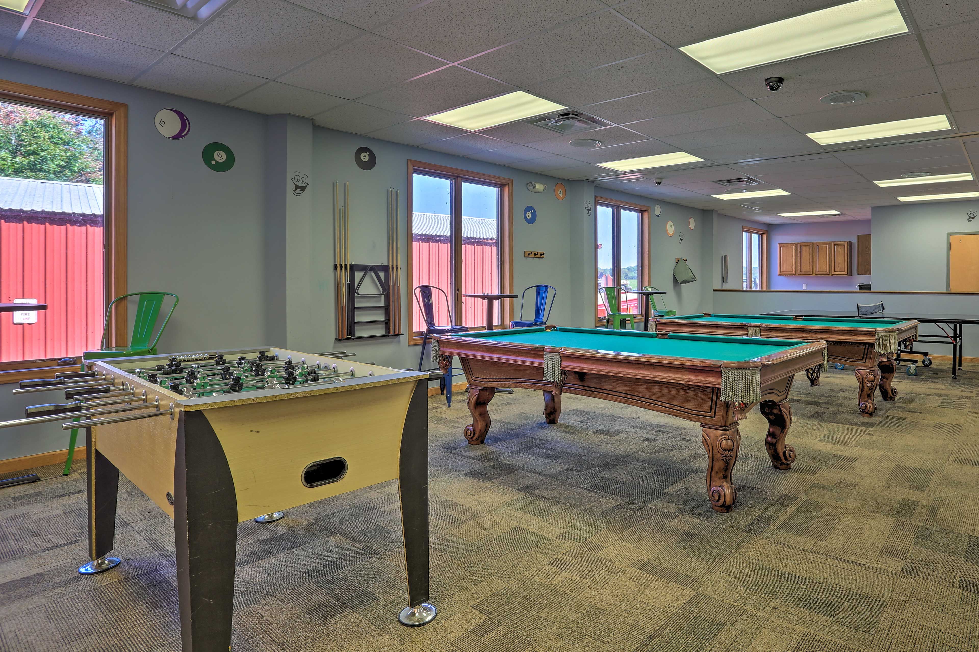 Challenge someone to a game of pool in the game room.