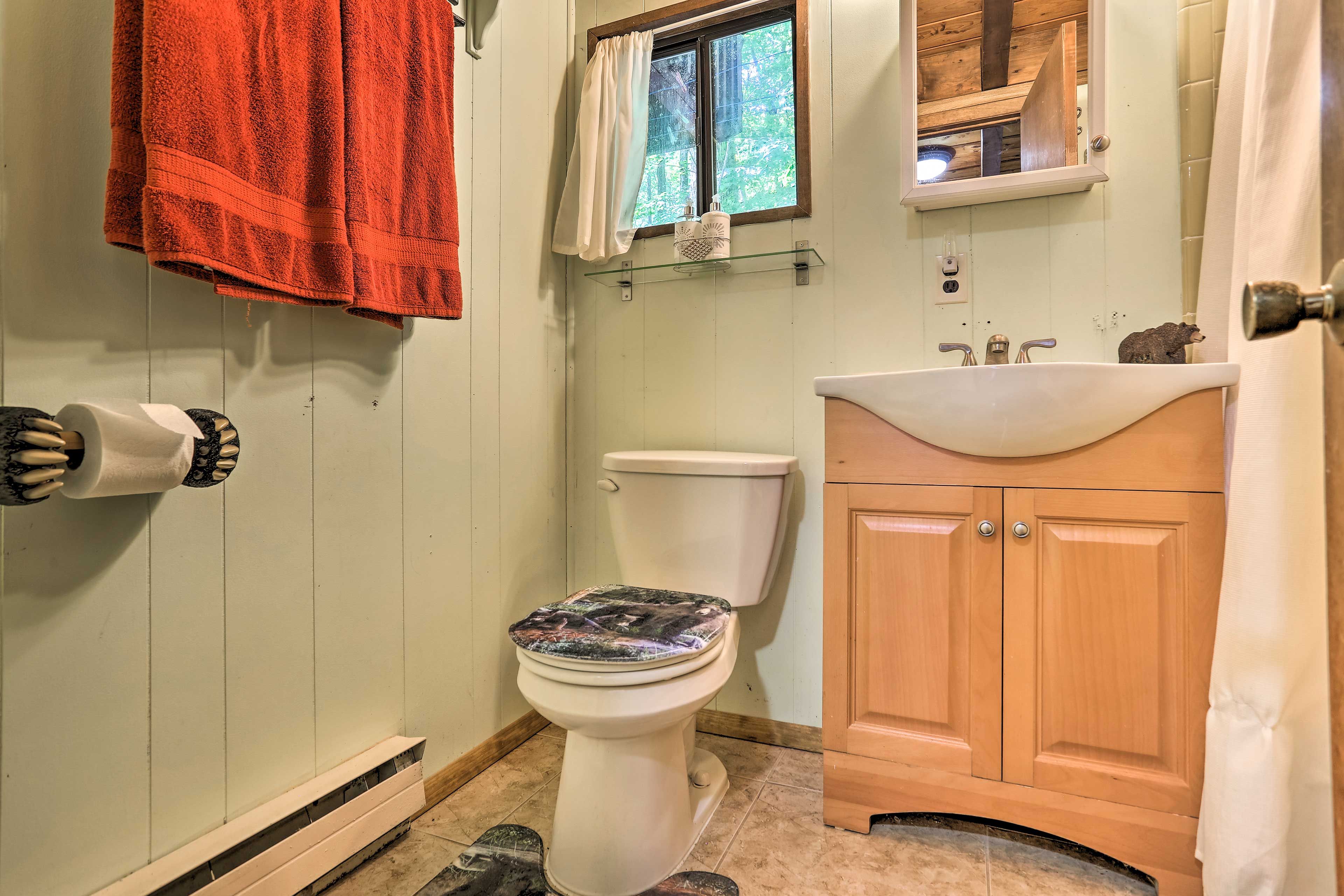 The second bathroom has a shower/tub combo.
