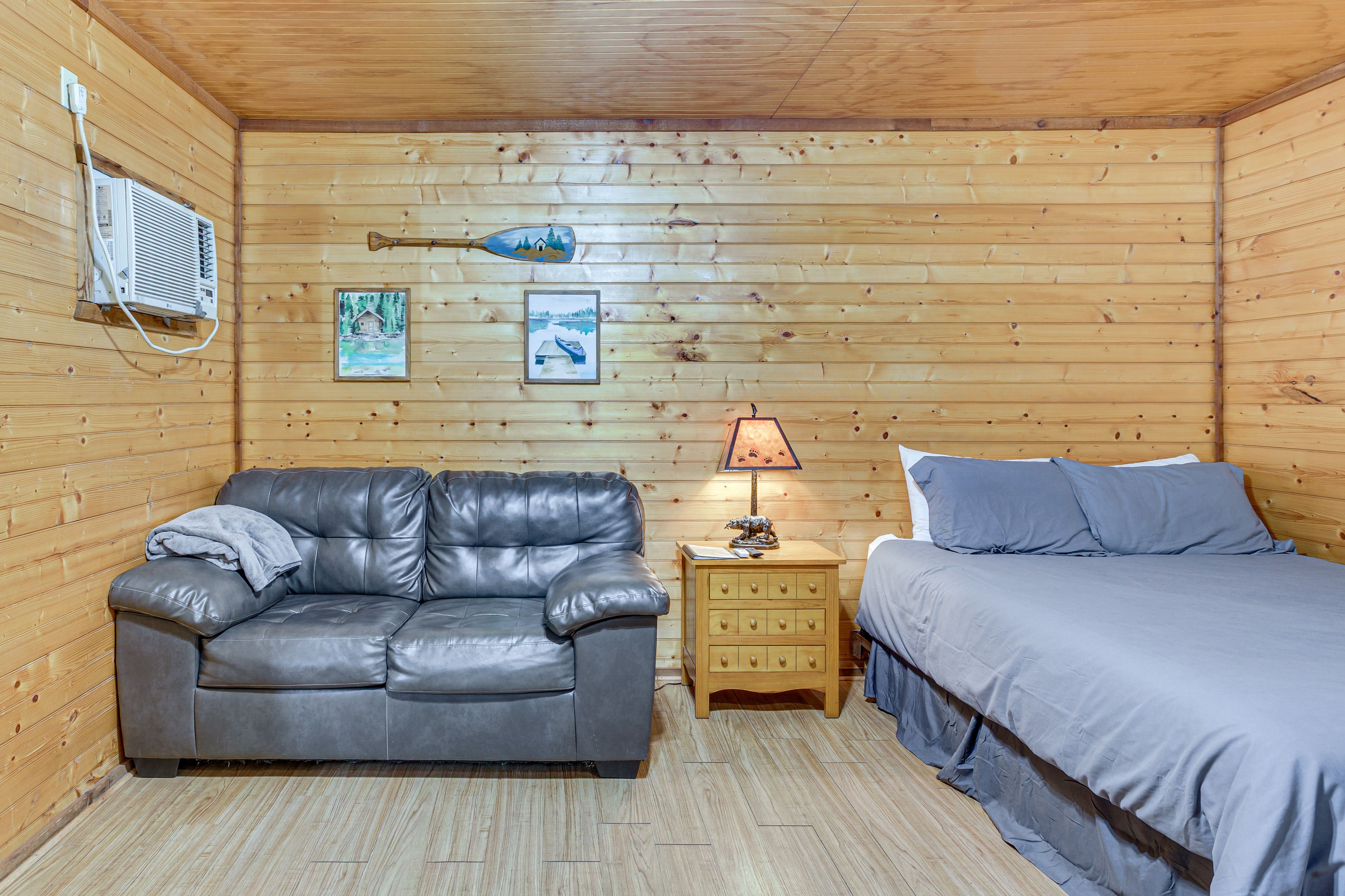 Living Area | Queen Bed | Twin Bed | Flat-Screen TV