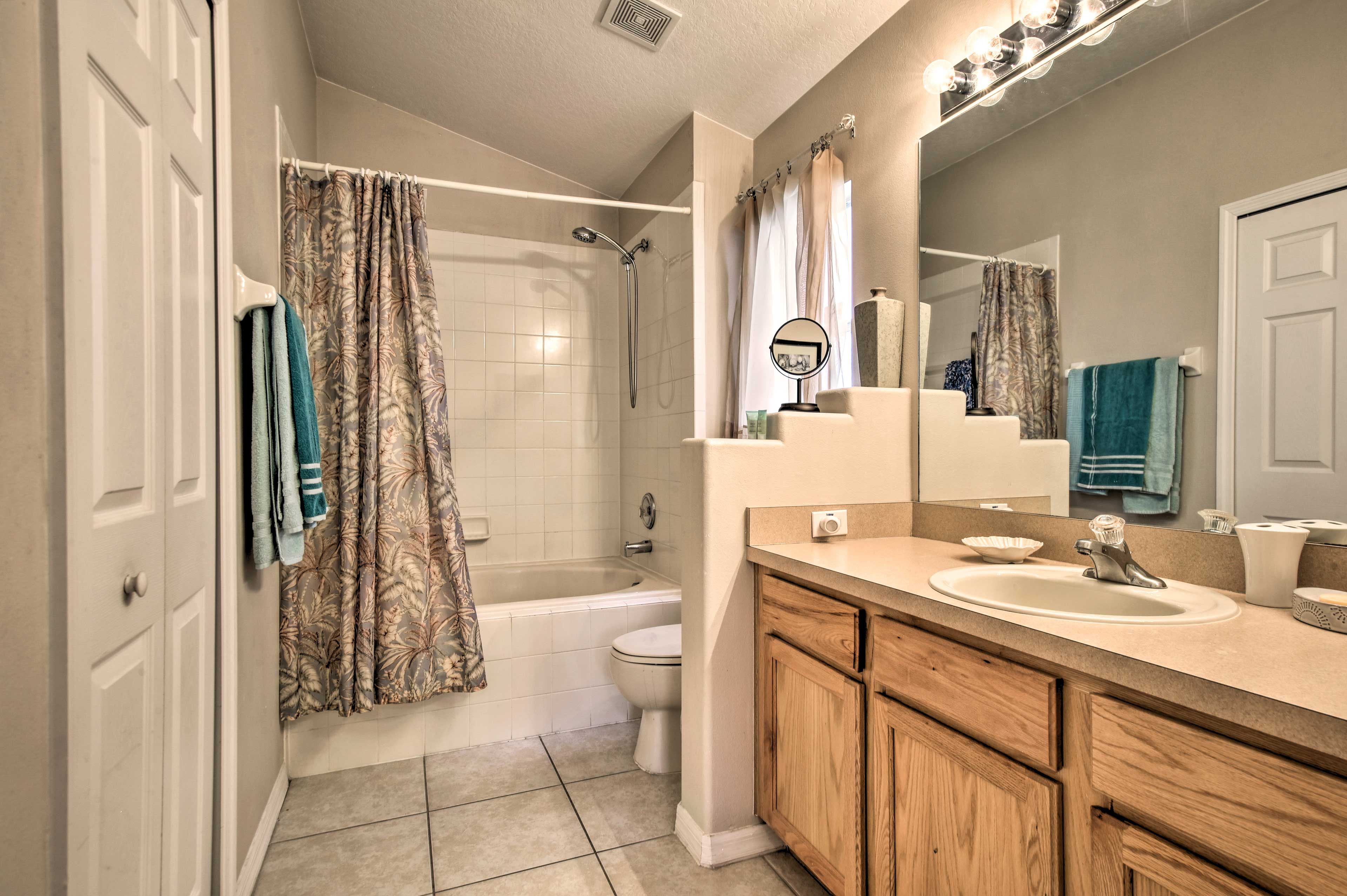 The en-suite bathroom is complete with a shower/tub combo.