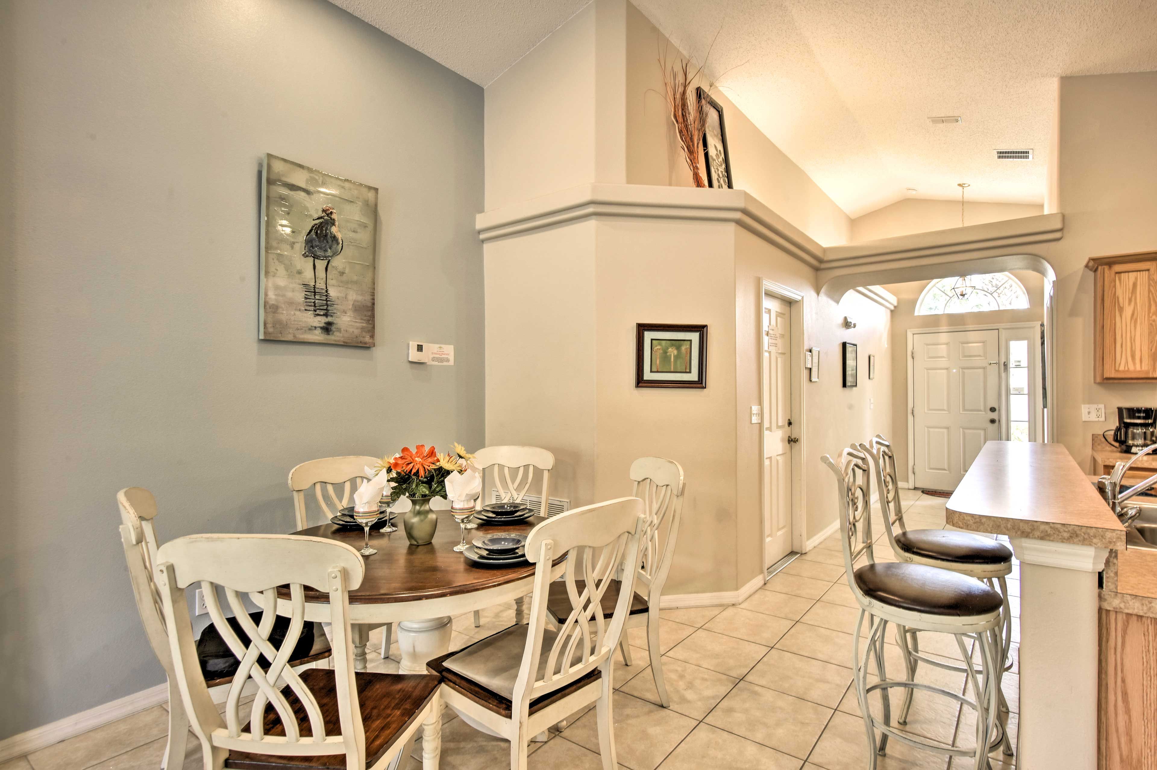 There is seating for 6 guests at the dining table.