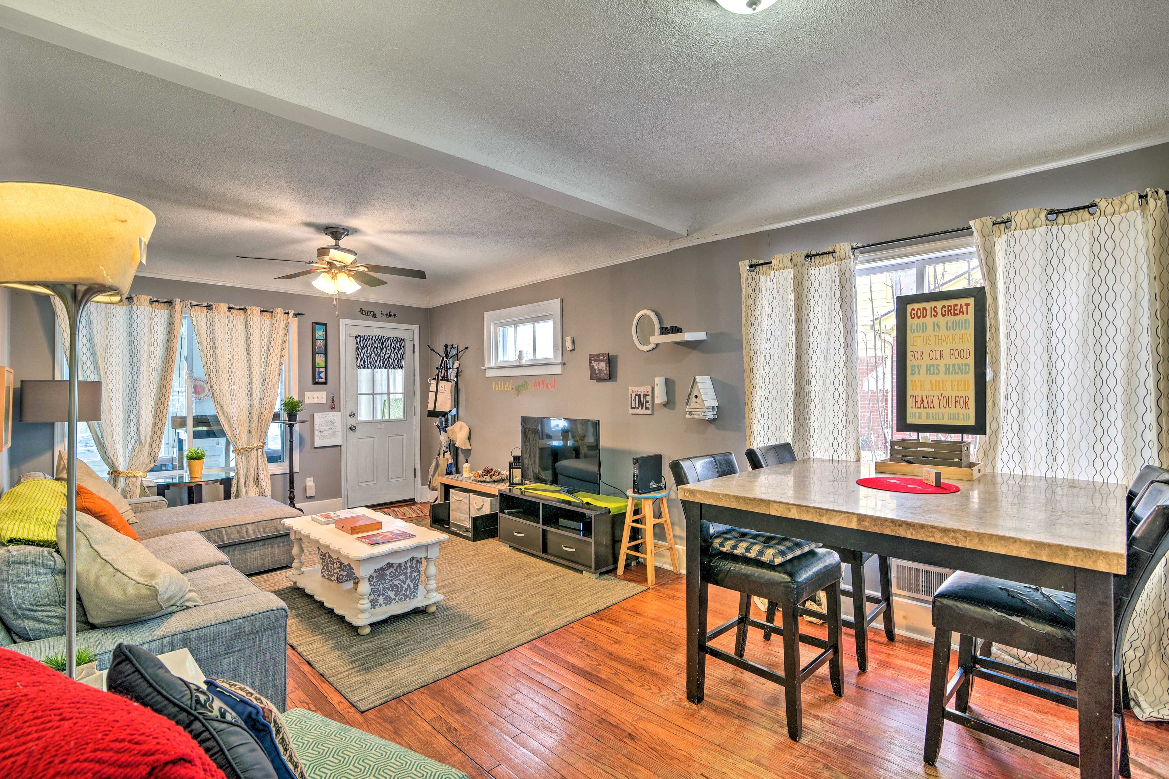 There is seating for 4 guests at the dining table.