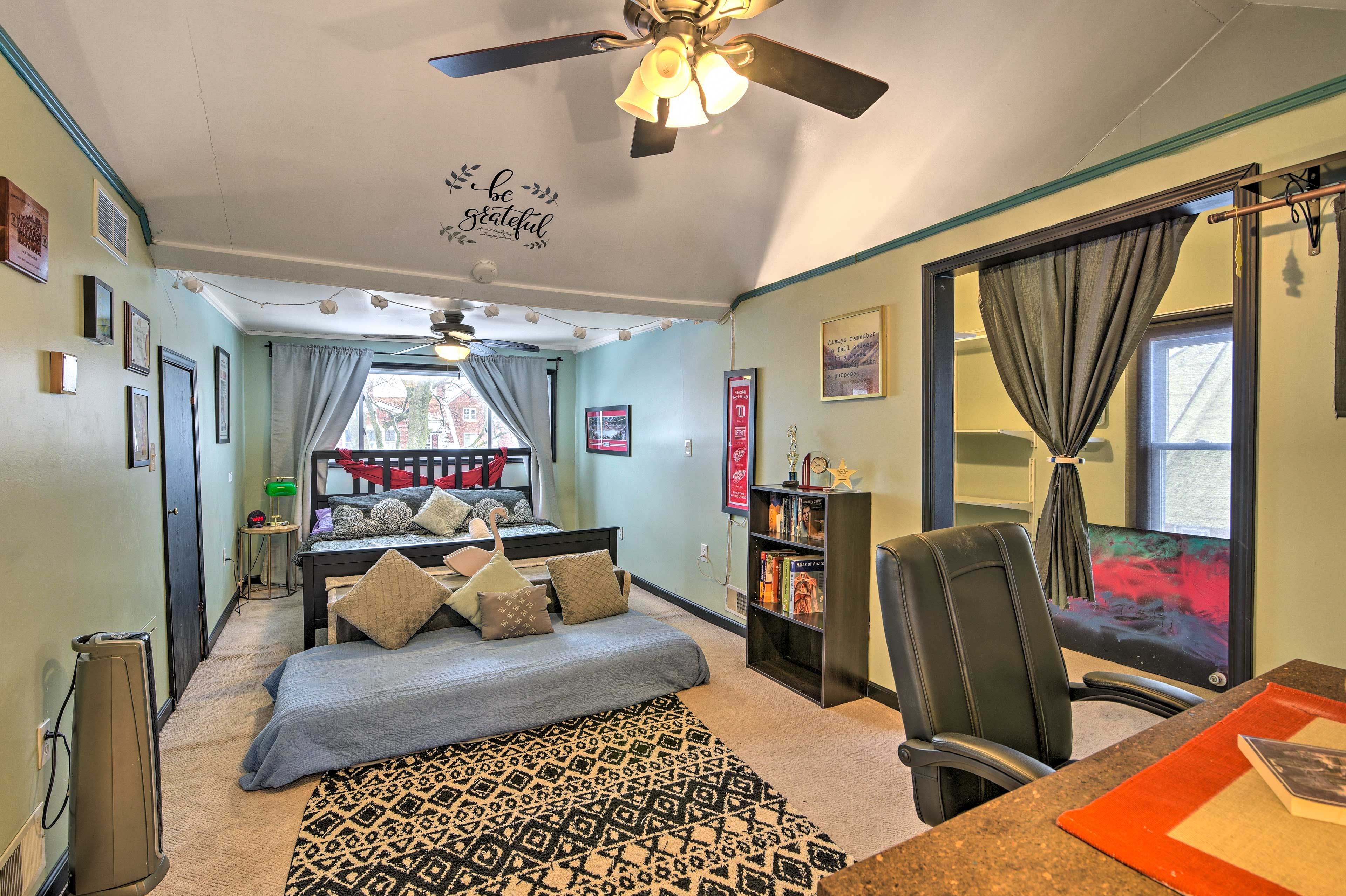 The first bedroom boasts a king bed and vaulted ceilings.