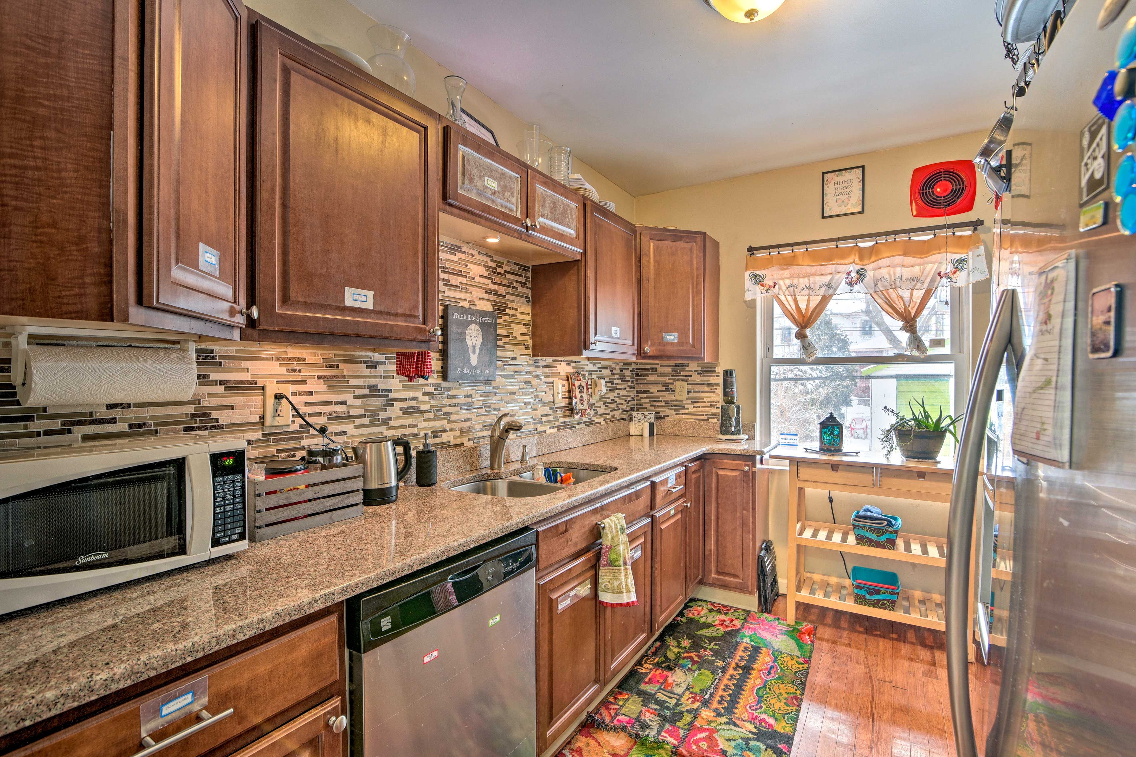 This kitchen is fully equipped and stocked with cooking basics.