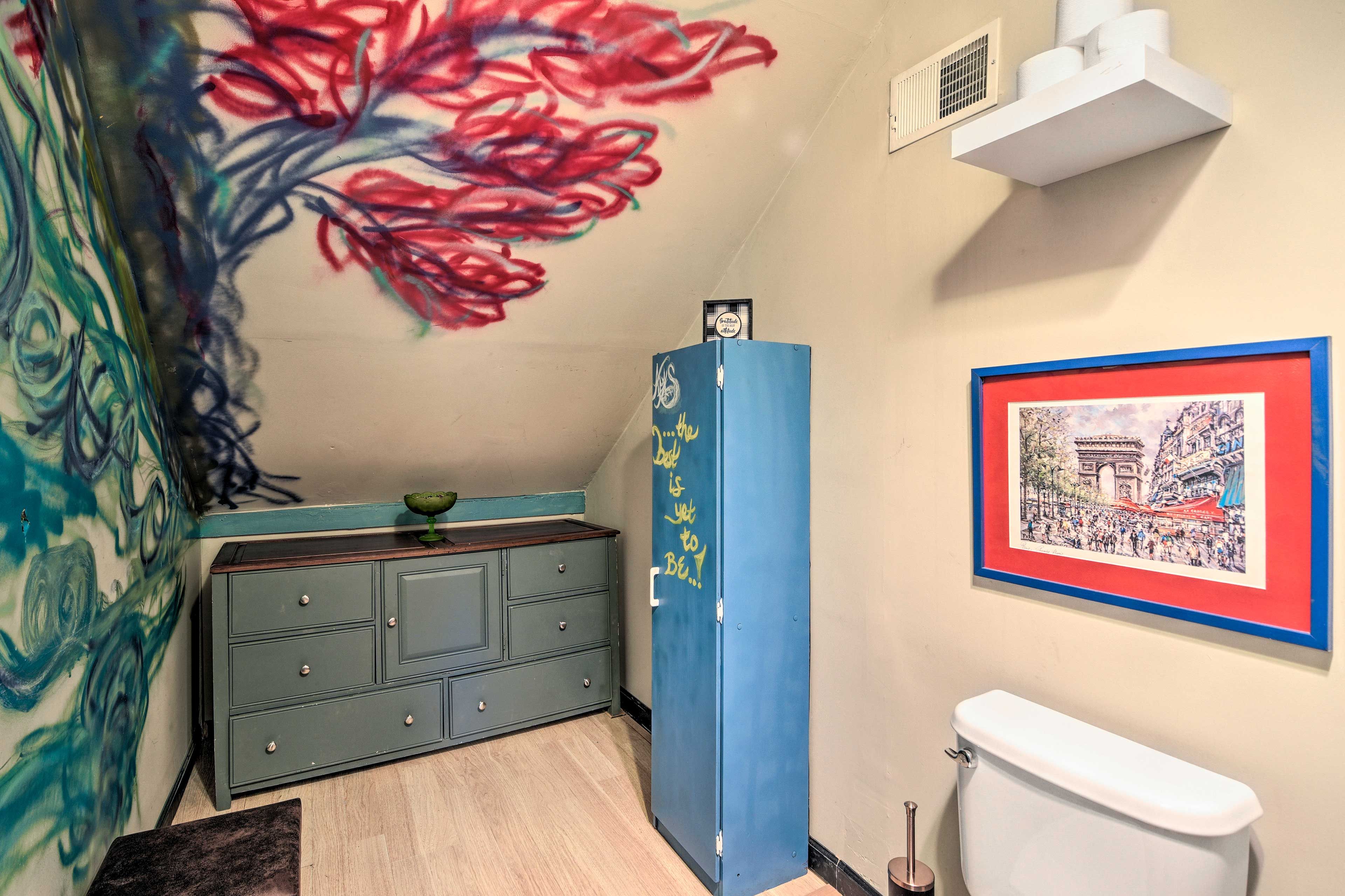 A colorful half bath completes the bathroom count.