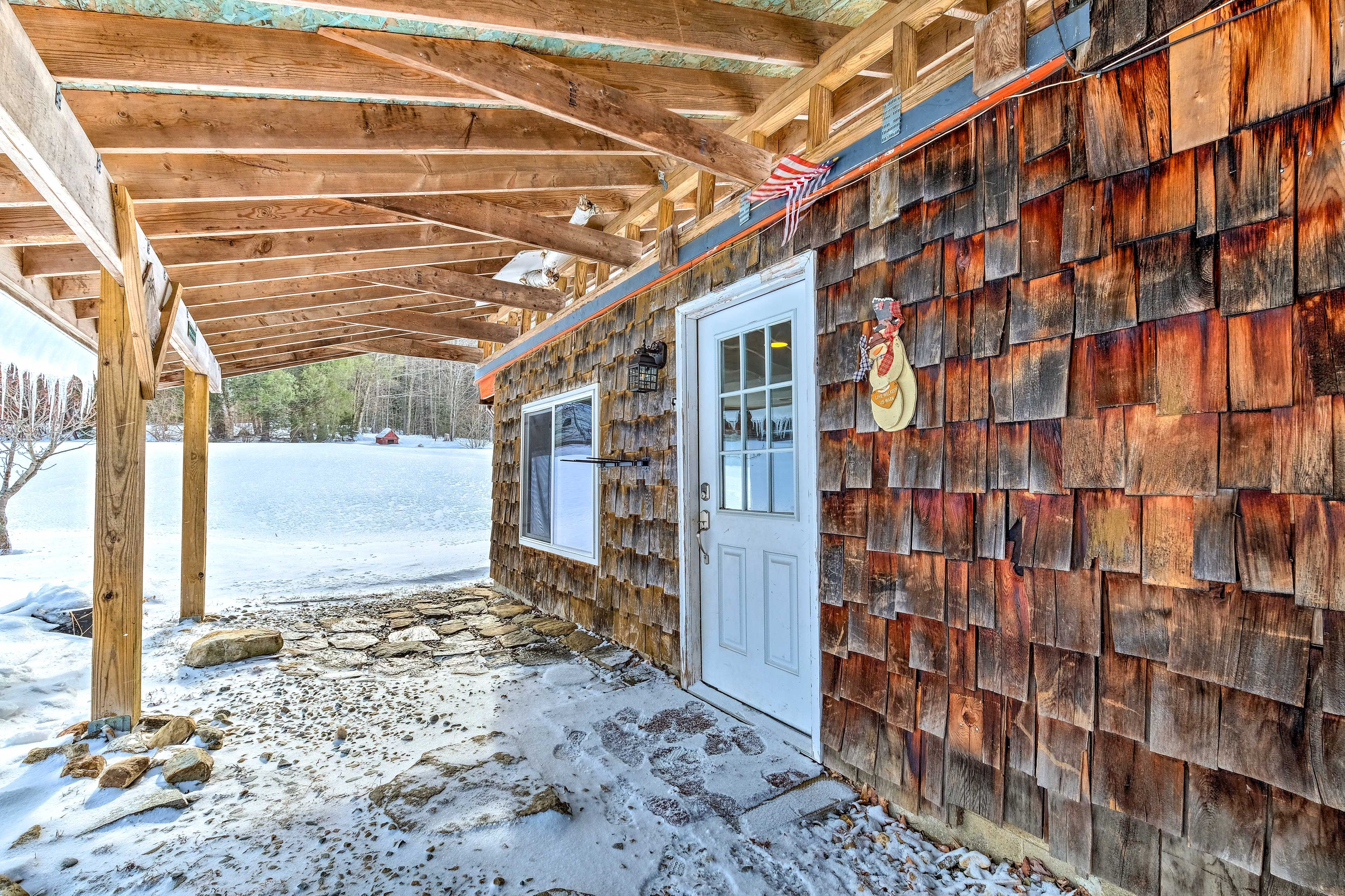 This property is accessed under this porch.