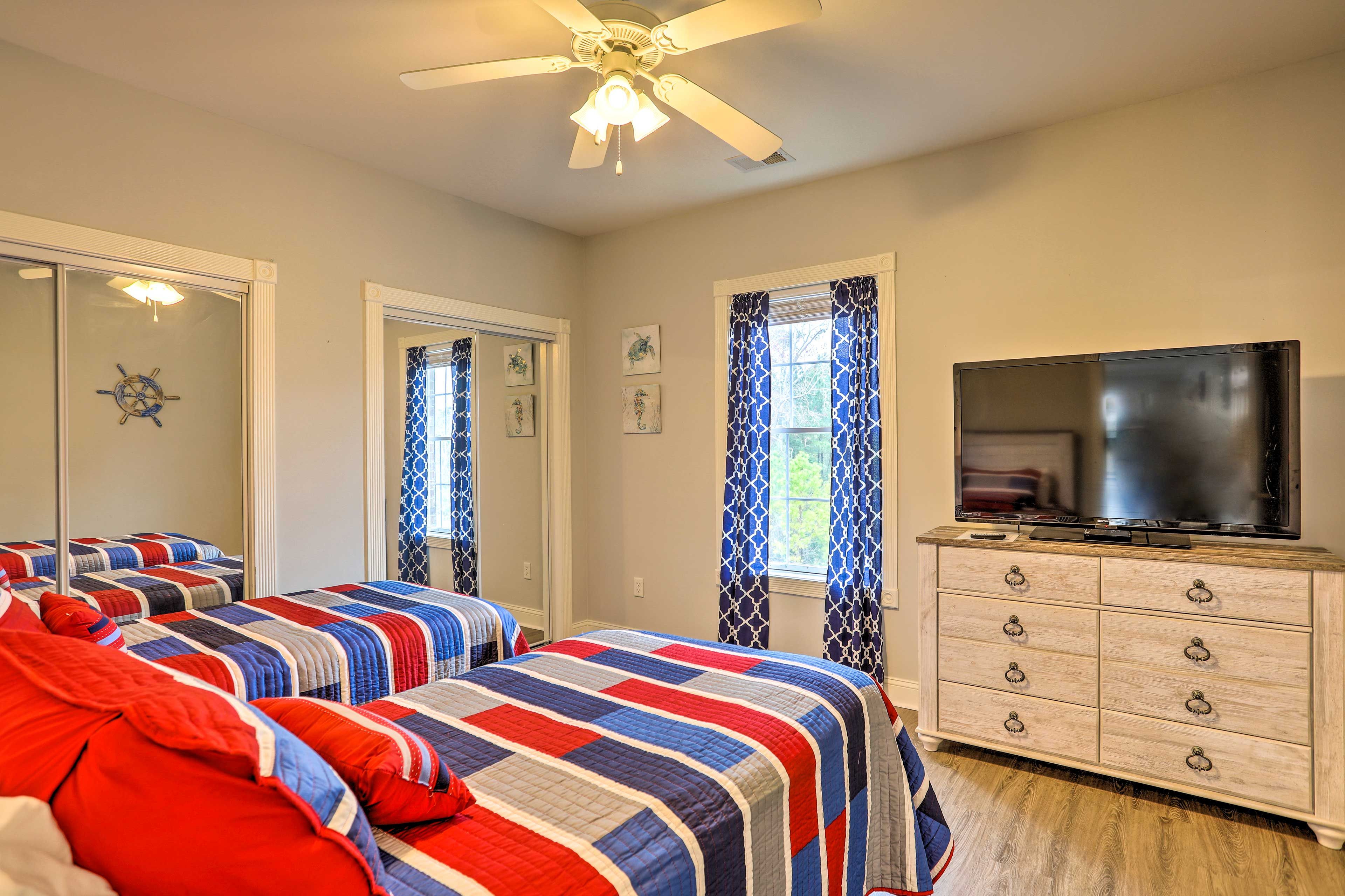 Each bedroom has a flat-screen TV.