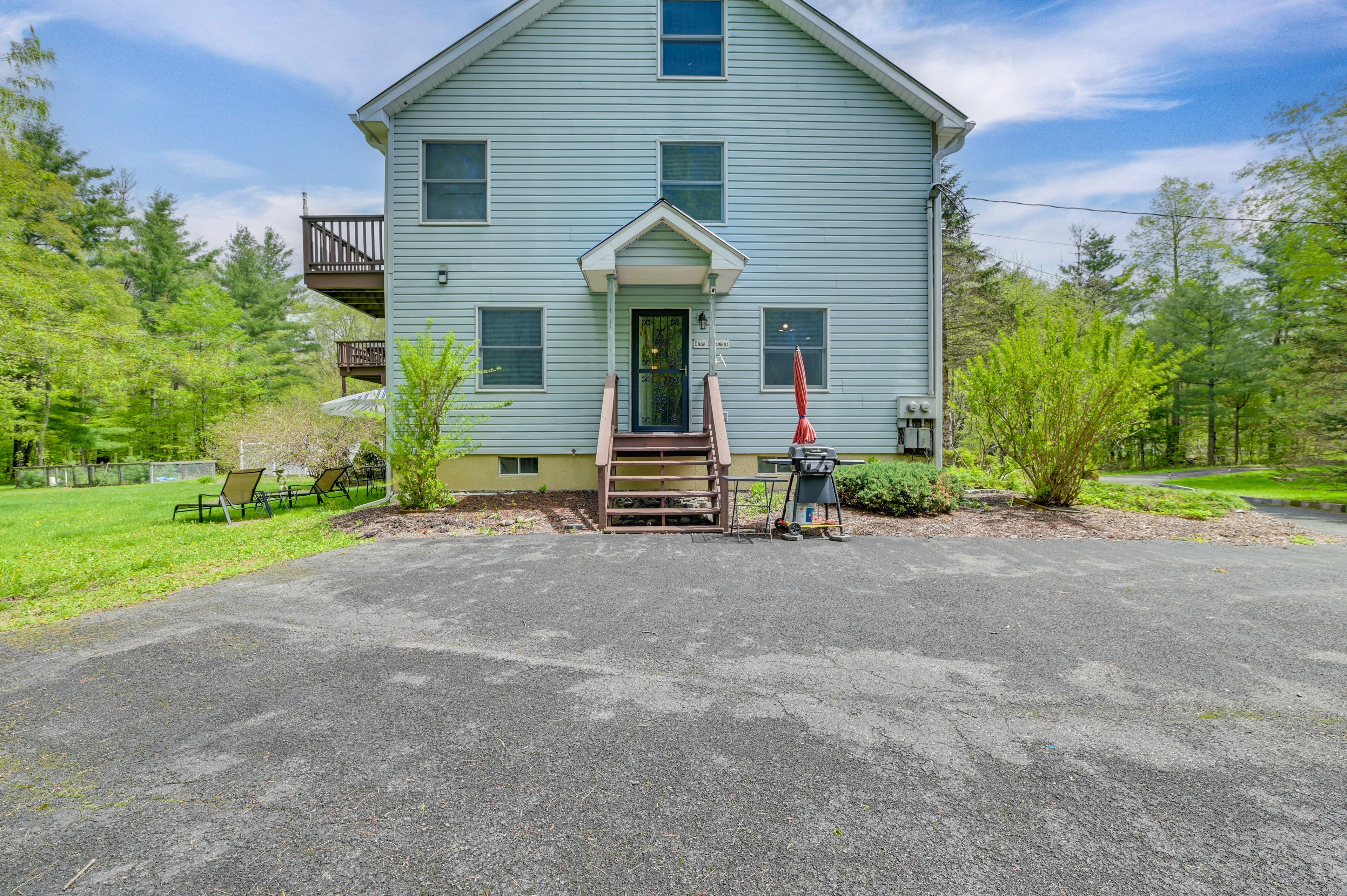 Unit Exterior | Parking | Driveway (4 Vehicles) | Shared Outdoor Area