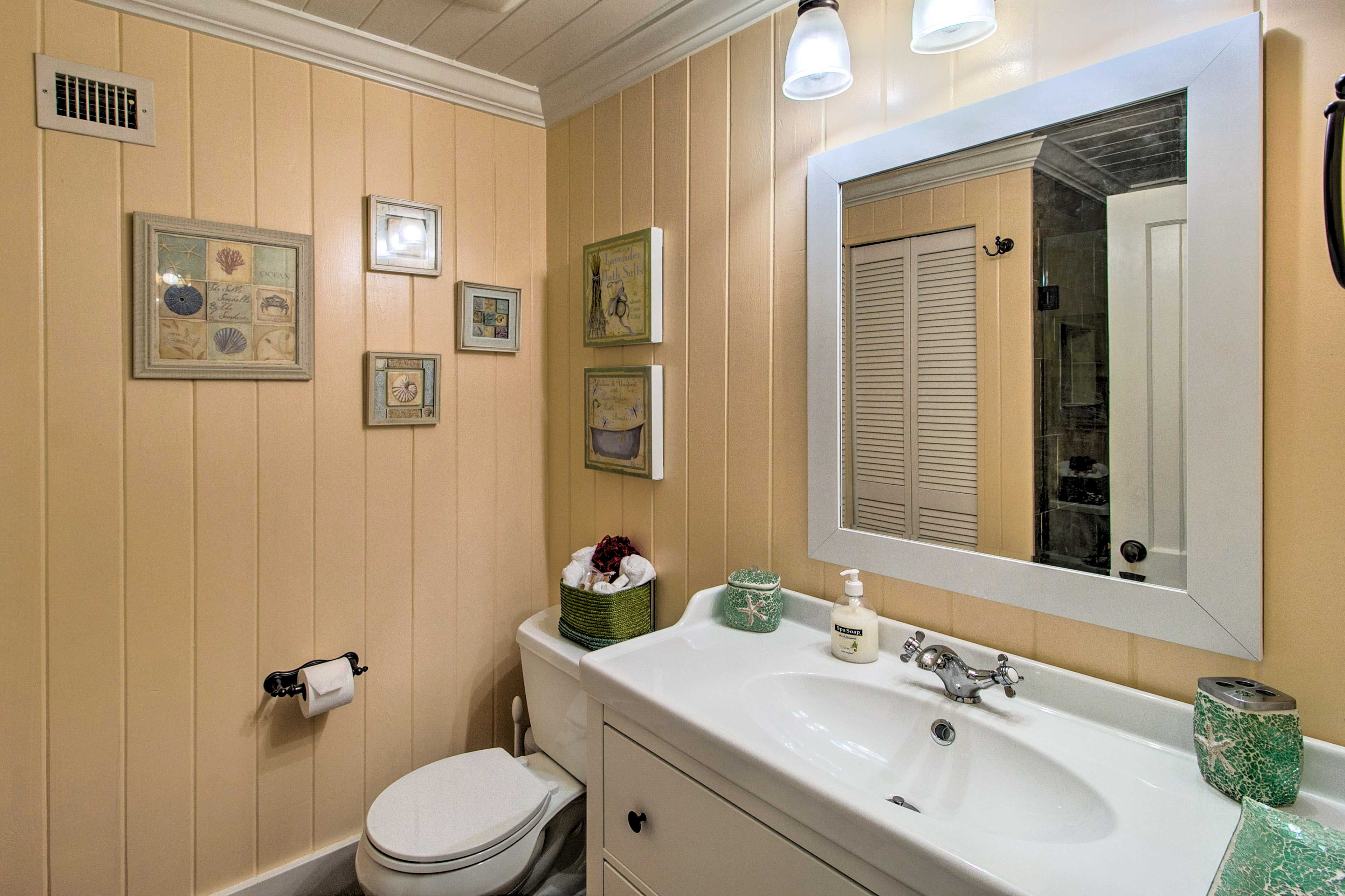 Freshen up in the home's beautiful bathroom.