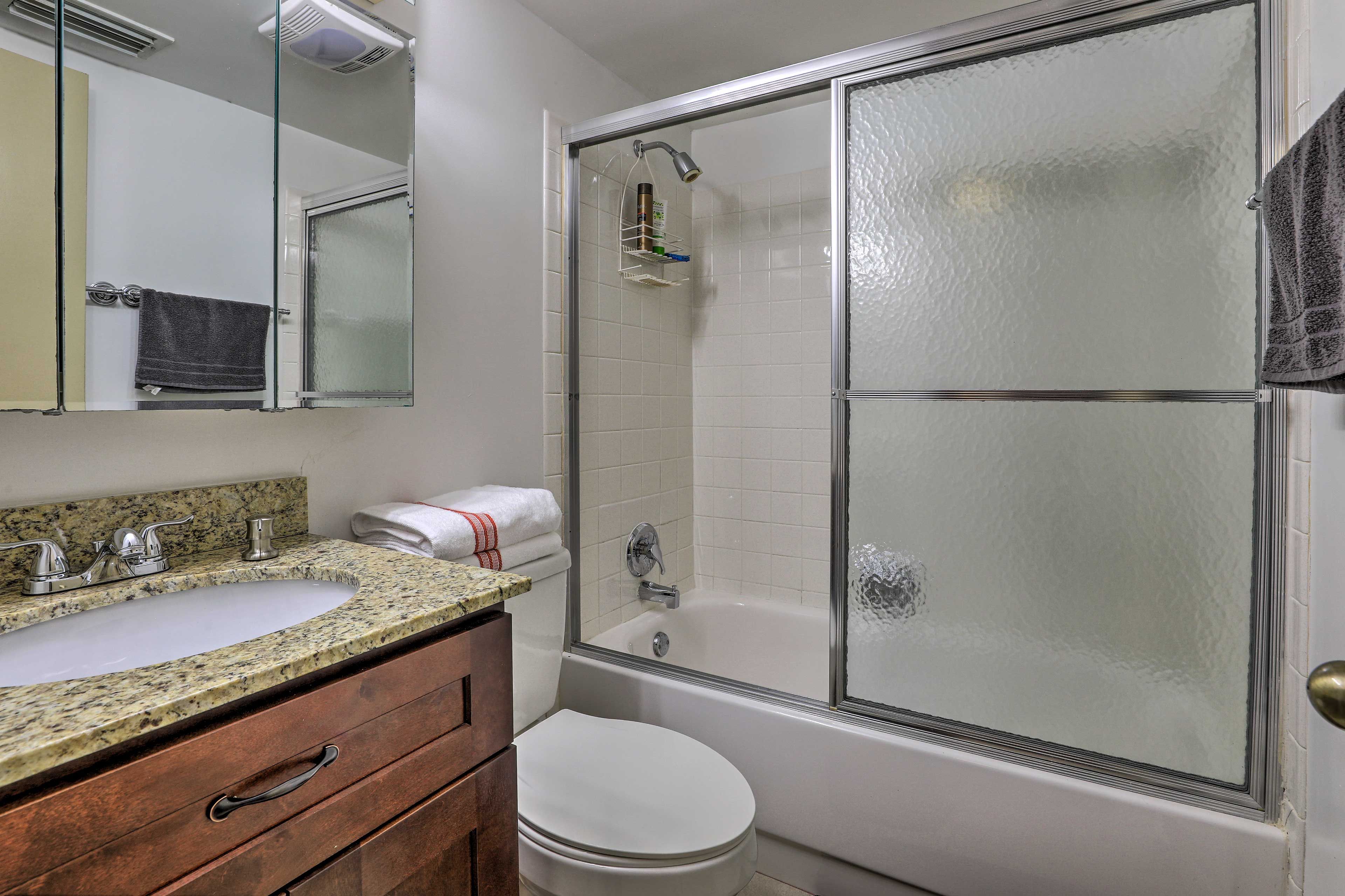 Rinse the chlorine out of your hair in the second bathroom's shower/tub combo!