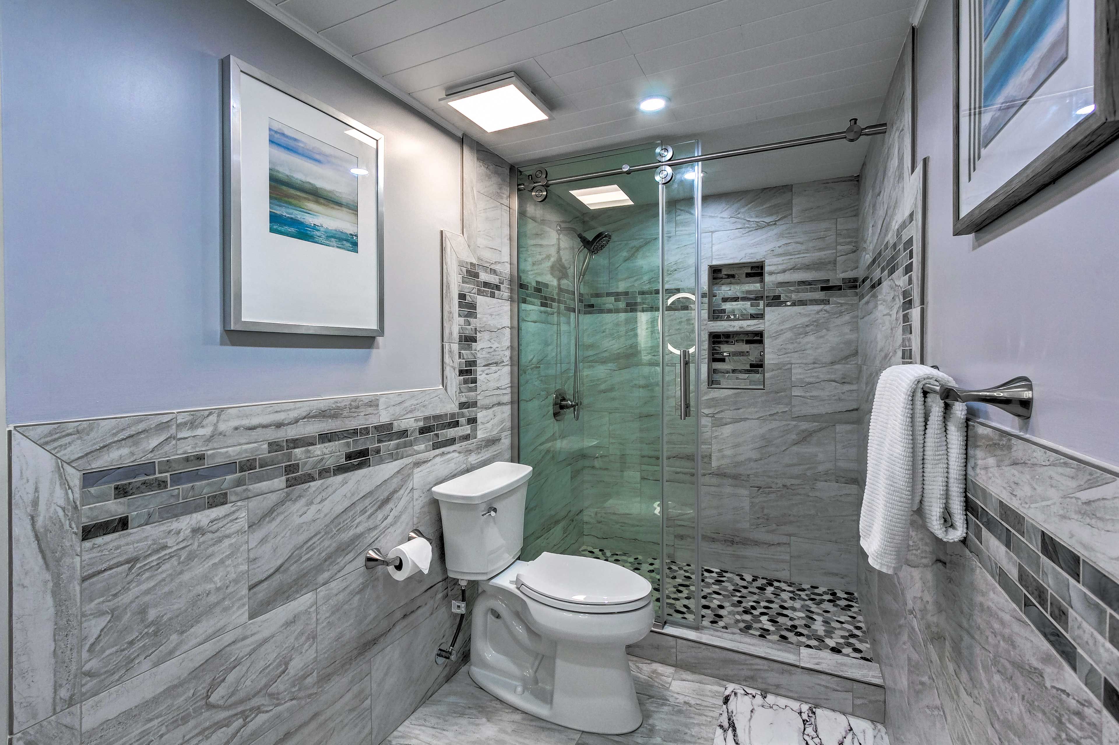 Rinse the sand from the day away in the walk-in shower.