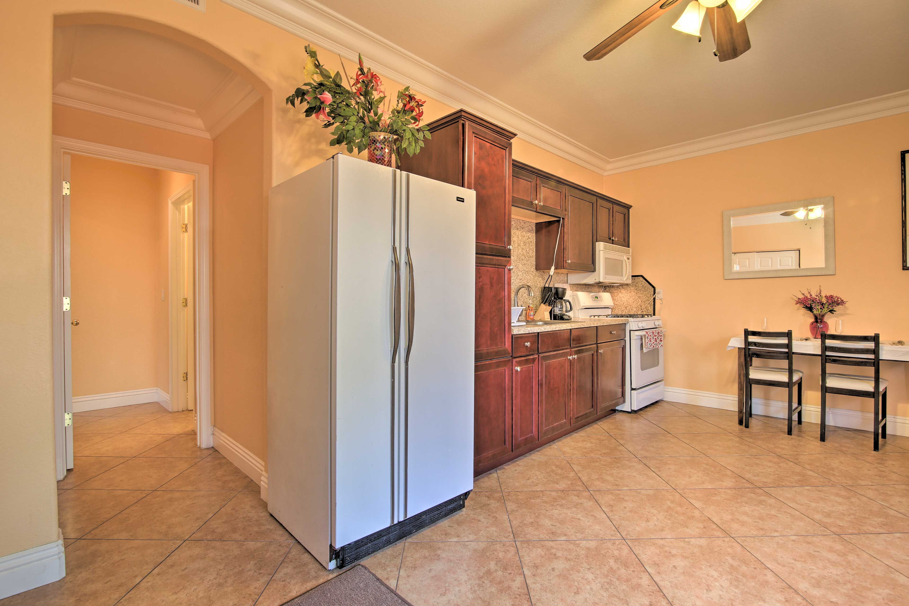 The apartment offers a full kitchen for your convenience.