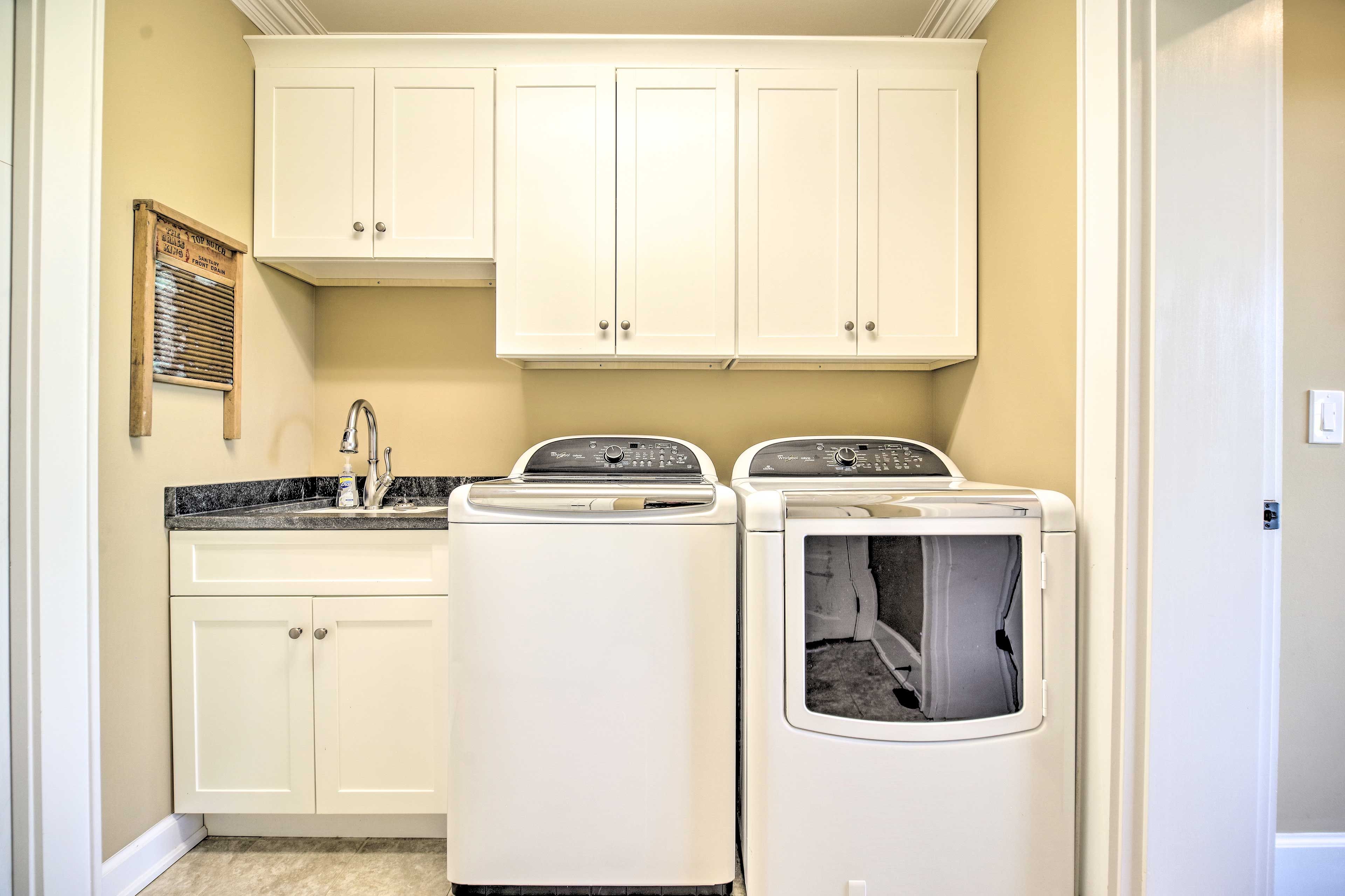 A laundry room adds a convenient touch to the home.