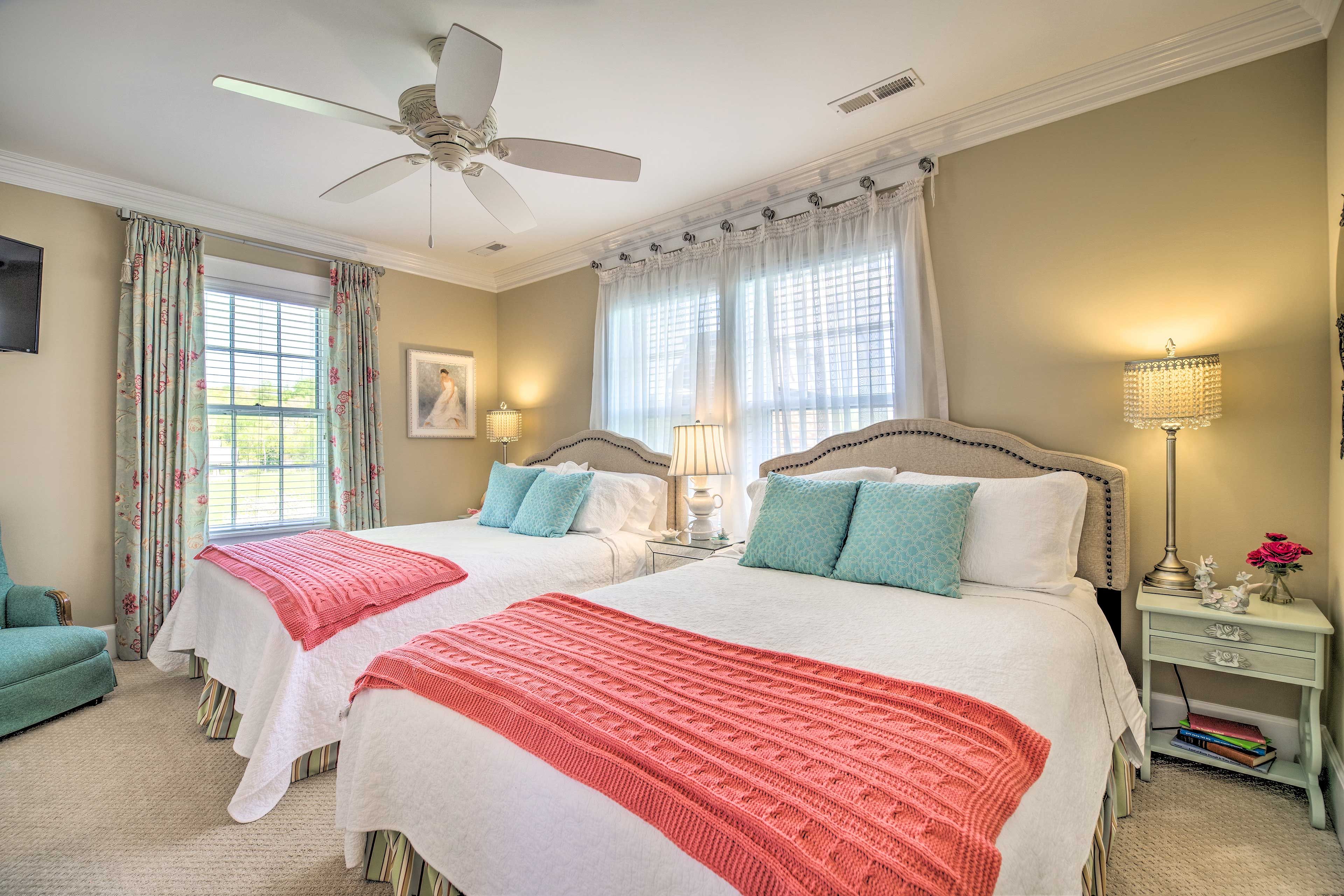 This bedroom has space for 4 with 2 queen beds.