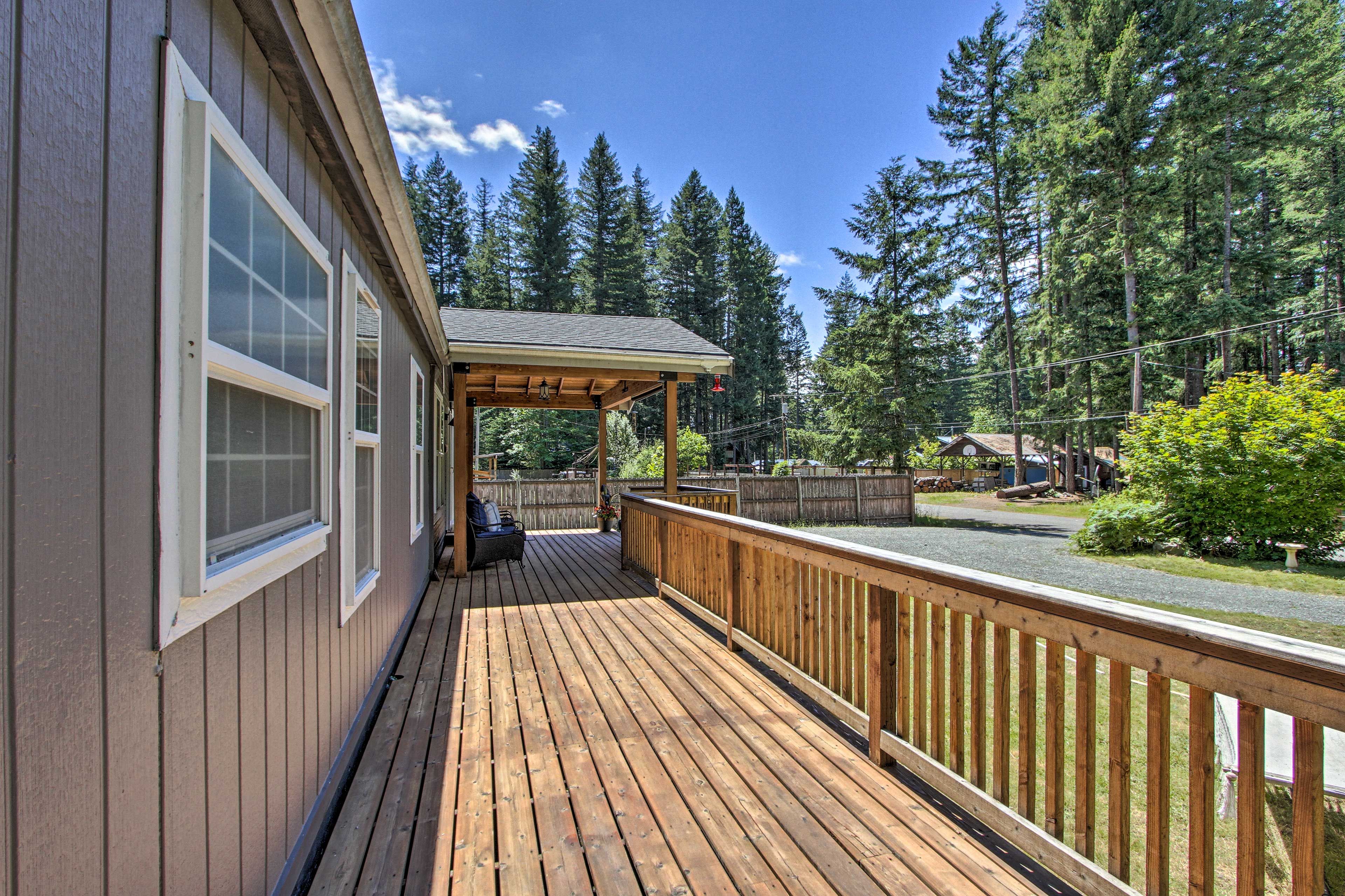 The wraparound porch is perfect for enjoying the great outdoors.