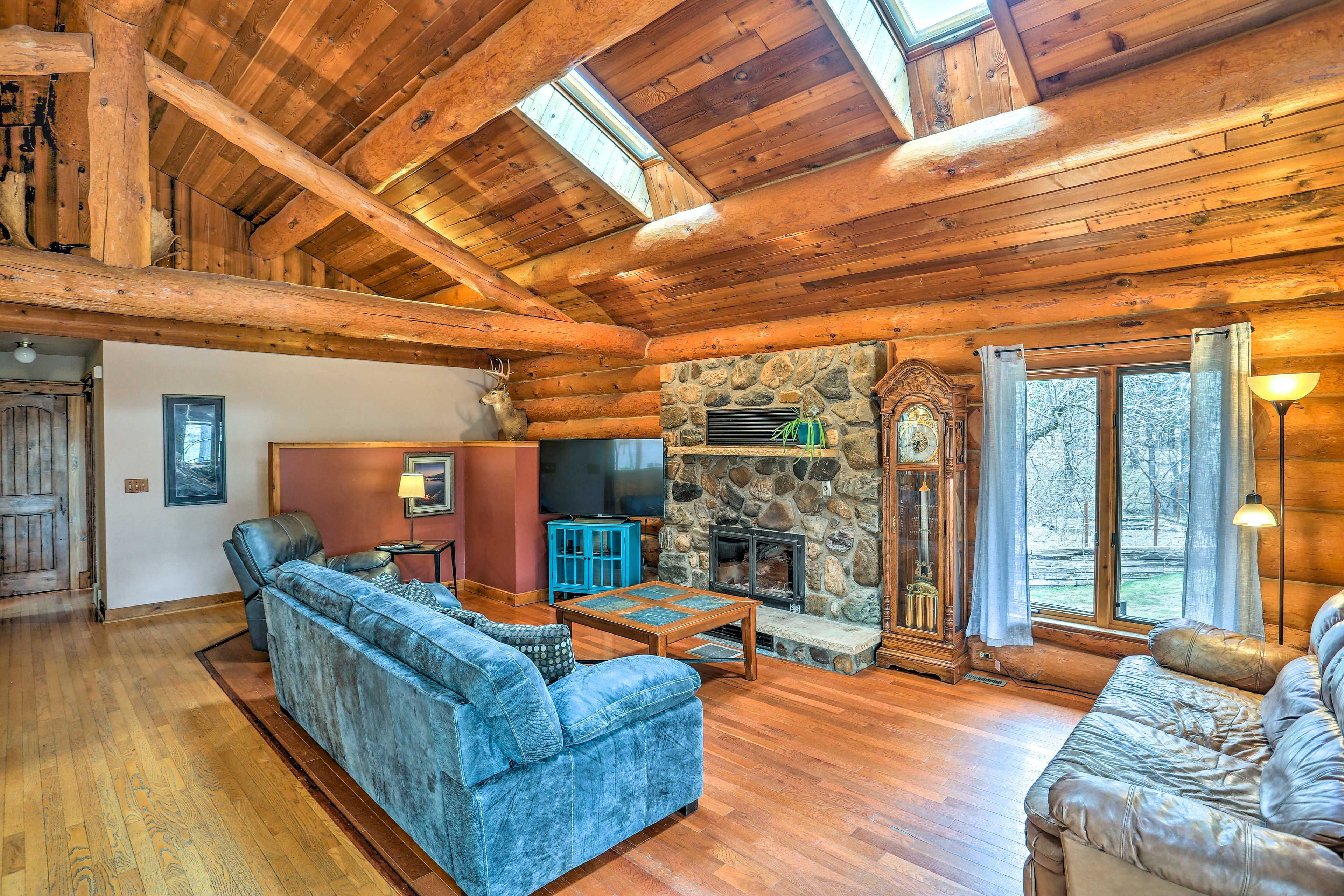 Boasting 3,200 square feet, this cabin offers vaulted ceilings and wood beaming.