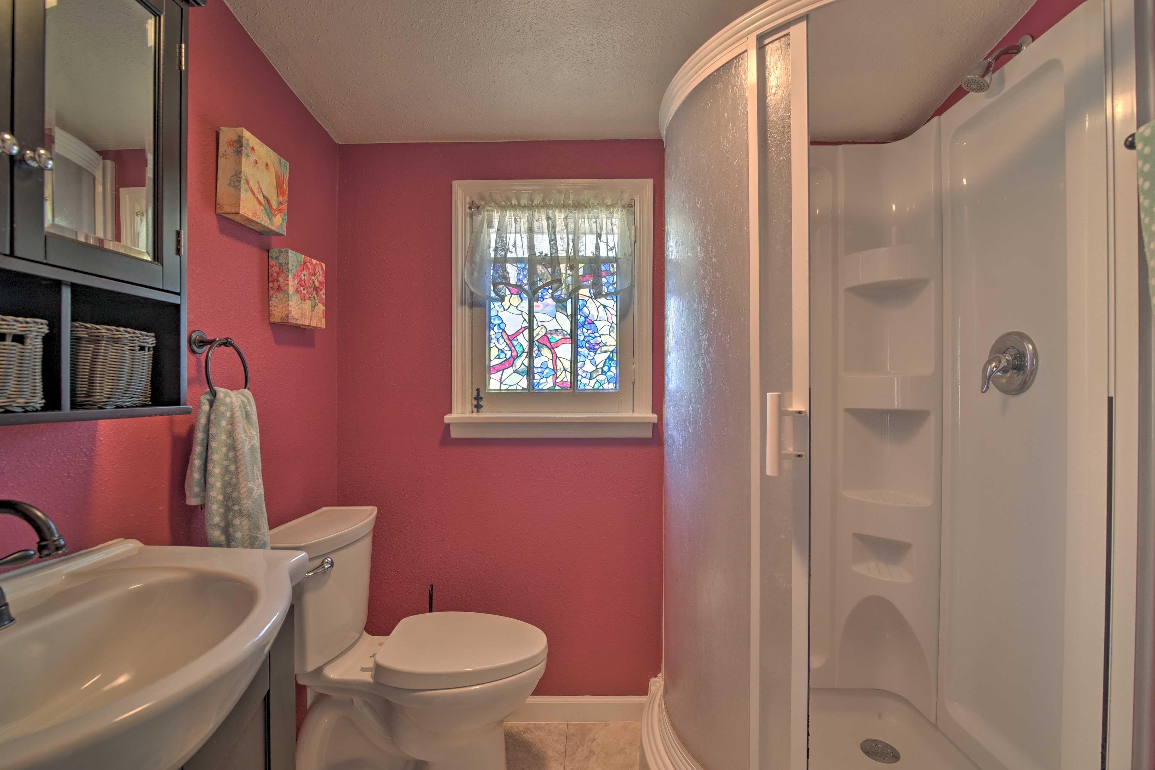 The attached bathroom features a shower.